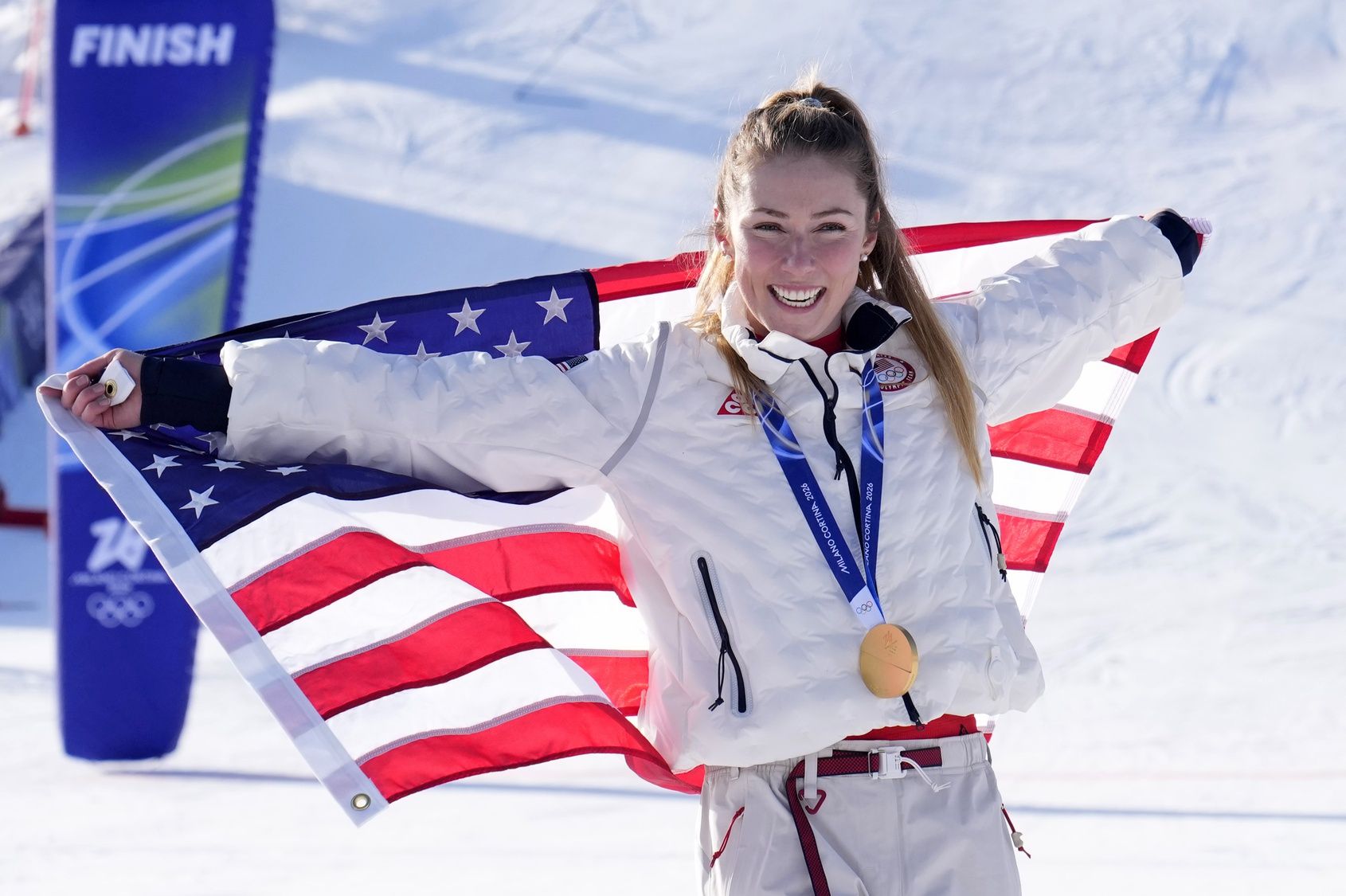 Gold medalist Mikaela Shiffrin of the United States celebrates during the medal ceremony for the women's slalom during the Milano Cortina 2026 Olympic Winter Games at Tofane Alpine Skiing Centre.