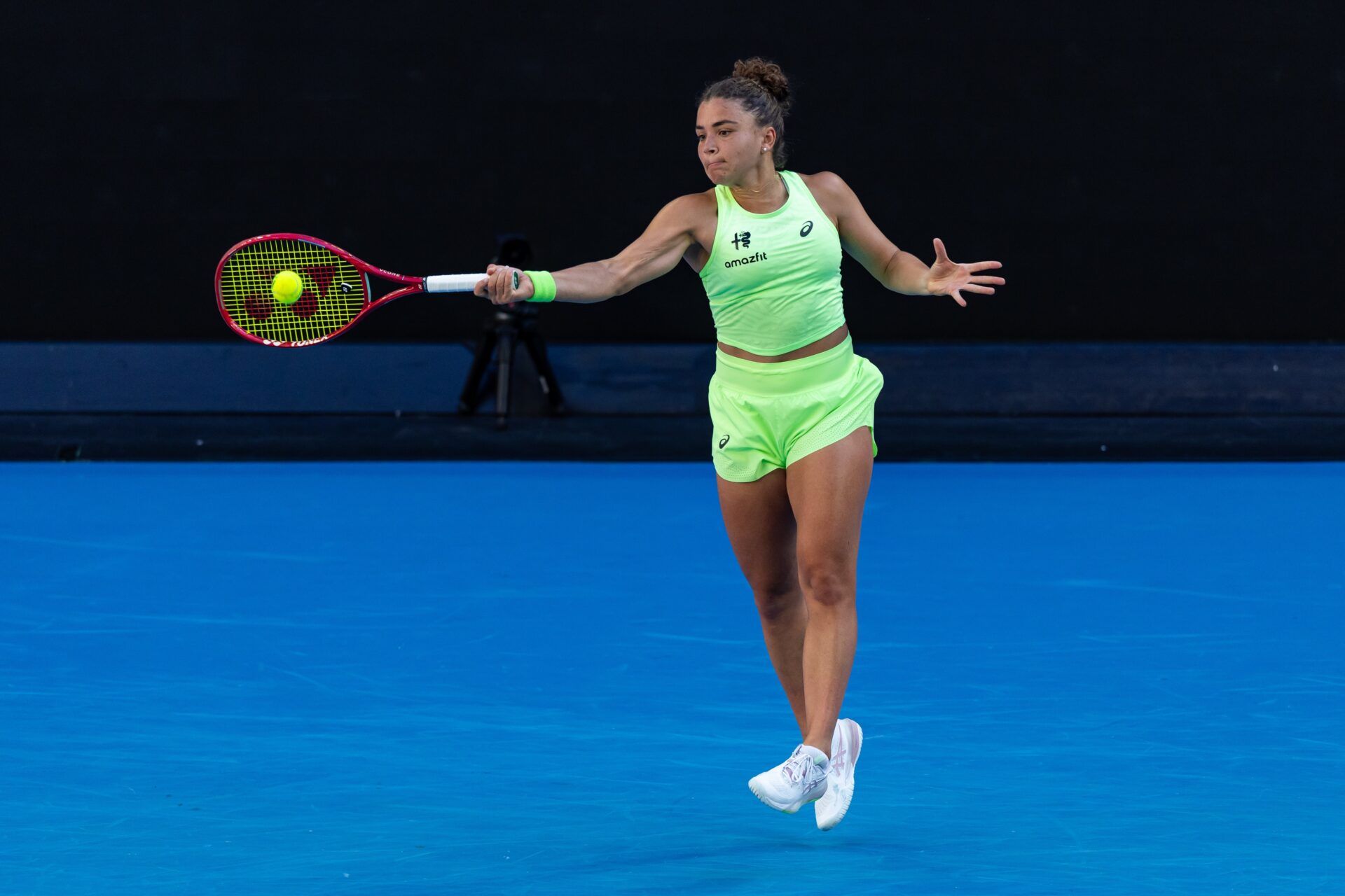 Jasmine Paolini of Italy in action against Iva Jovic of United States in the third round of the womens singles at the Australian Open at John Cain Arena in Melbourne Park.