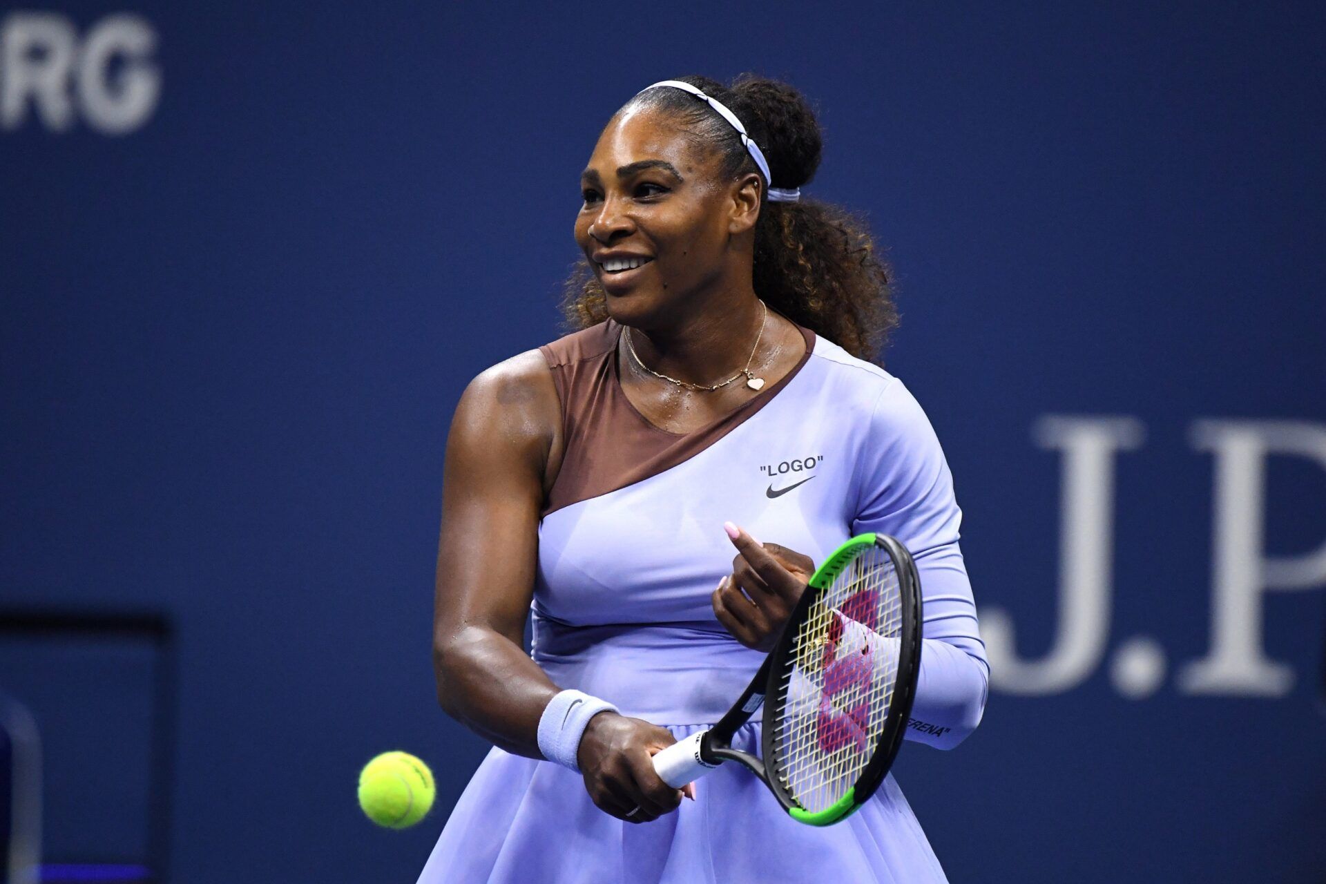 Serena Williams of the United States smiles as she challenges a call against Anastasija Sevastova of Latvia in a women's semi-final match on day eleven of the 2018 U.S. Open tennis tournament at USTA Billie Jean King National Tennis Center.