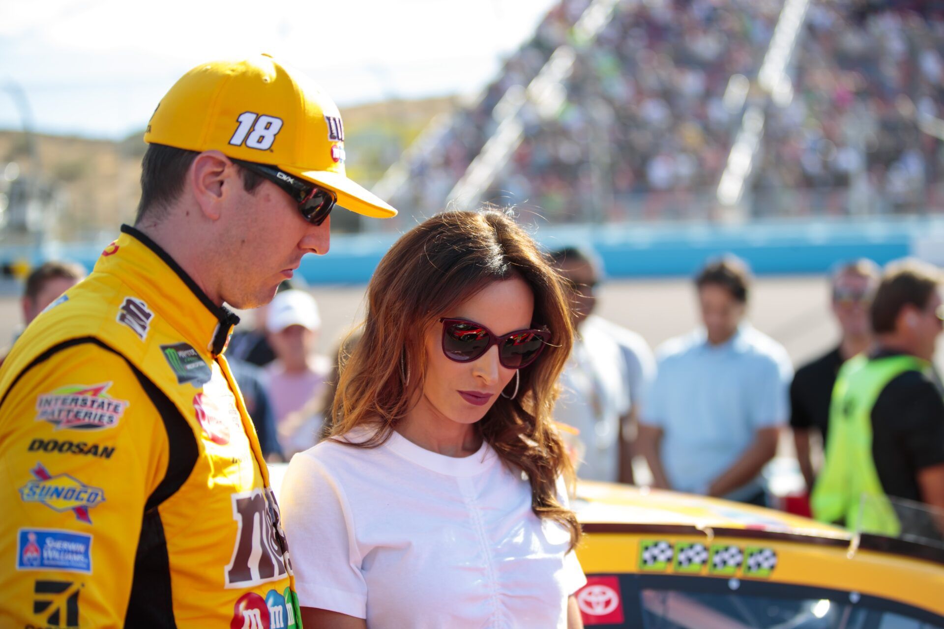 NASCAR Cup Series driver Kyle Busch (left) and wife Samantha Busch during the Bluegreen Vacations 500 at ISM Raceway.