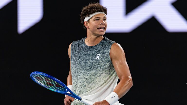 Ben Shelton of United States in action against Jannik Sinner of Italy in the quarterfinals of the mens singles at the Australian Open at Rod Laver Arena in Melbourne Park.