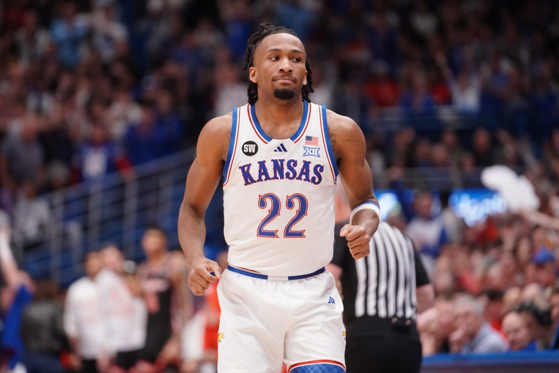 Kansas Jayhawks guard Darryn Peterson (22) jogs back after making a three-pointer against Houston Cougars during the game inside Allen Fieldhouse on Monday, Feb. 23, 2026.