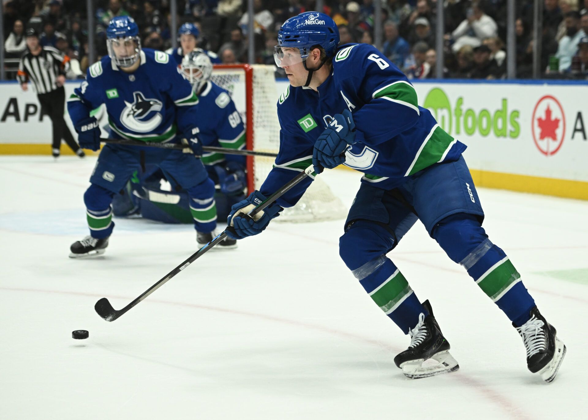 Vancouver Canucks right wing Brock Boeser (6) skates with the puck against against the Winnipeg Jets during the second period at Rogers Arena.