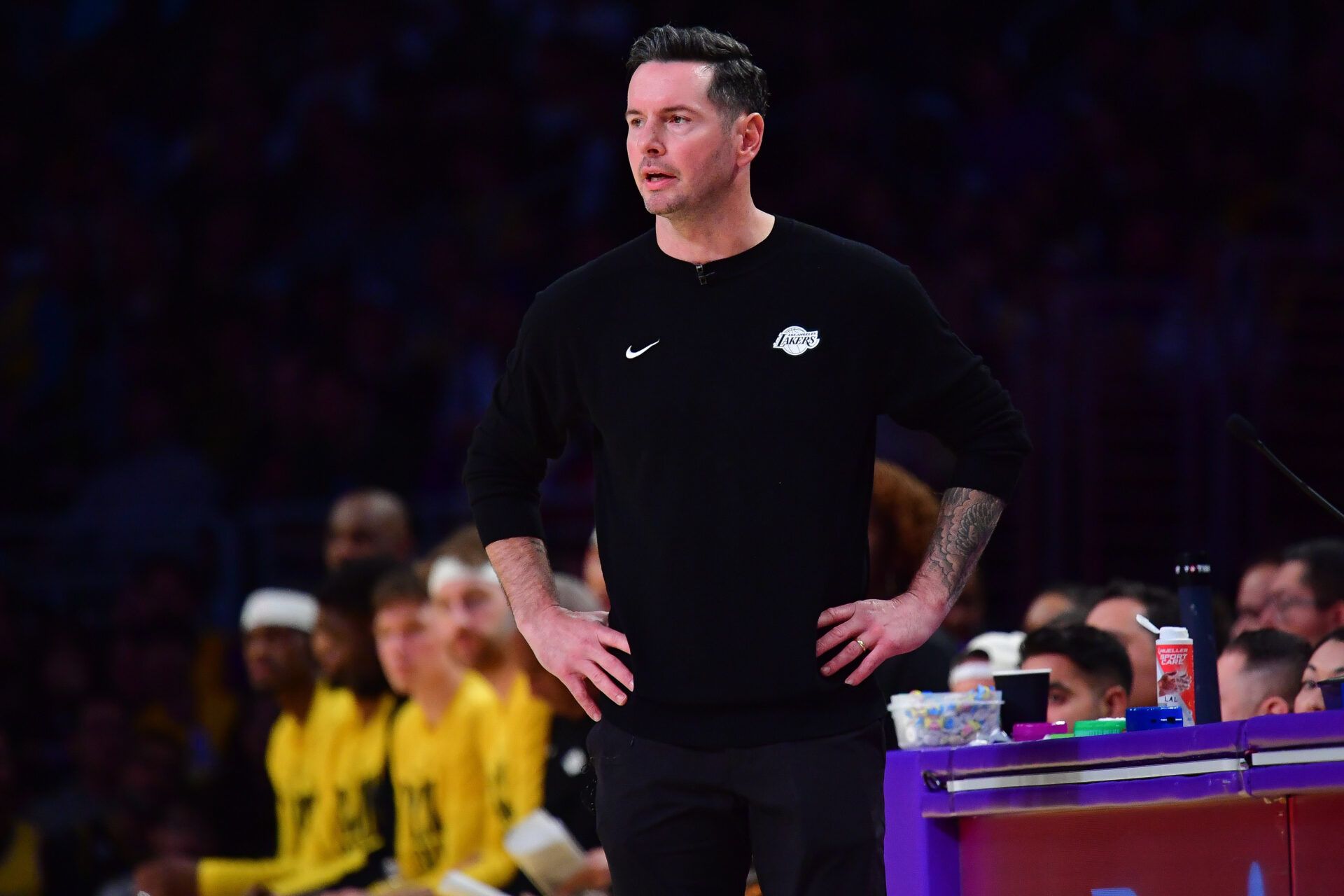 Los Angeles Lakers head coach JJ Redick watches game action against the Golden State Warriors during the first half at Crypto.com Arena.
