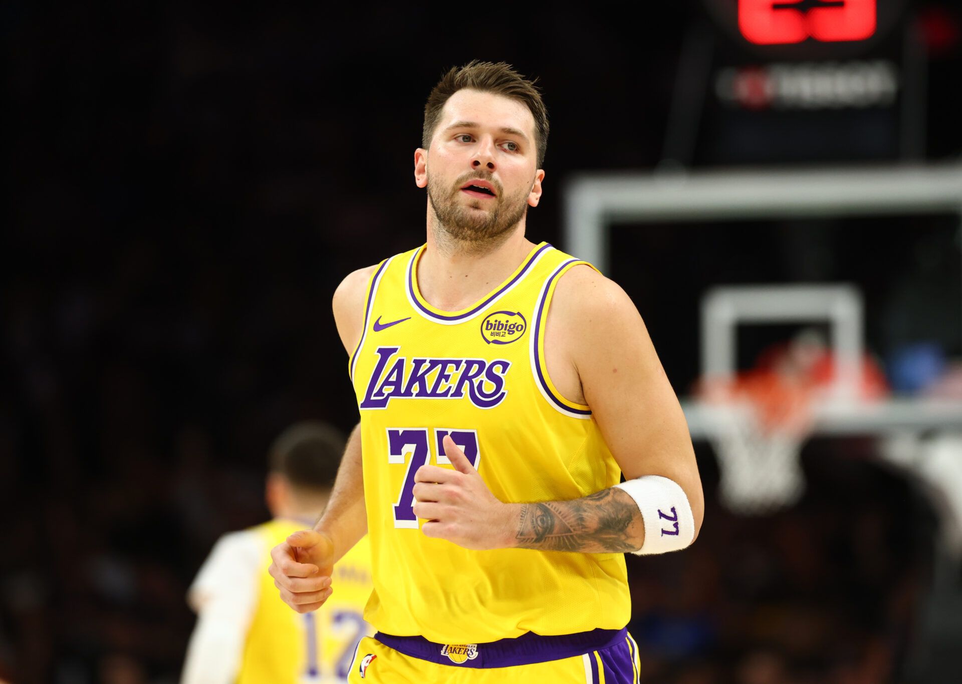 Los Angeles Lakers guard Luka Doncic (77) against the Phoenix Suns in the first half at Mortgage Matchup Center.