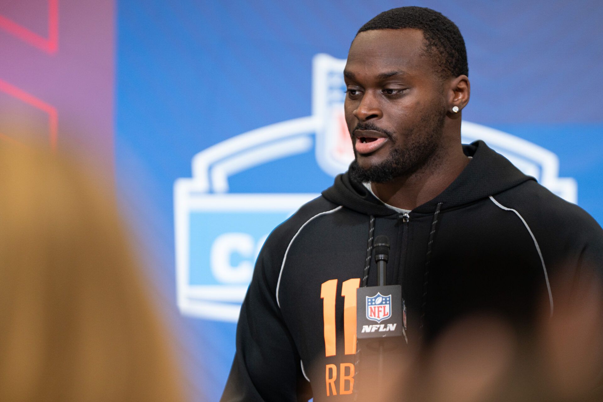 Notre Dame running back Jeremiyah Love (RB11) speaks to members of the media during the NFL Combine at the Indiana Convention Center.