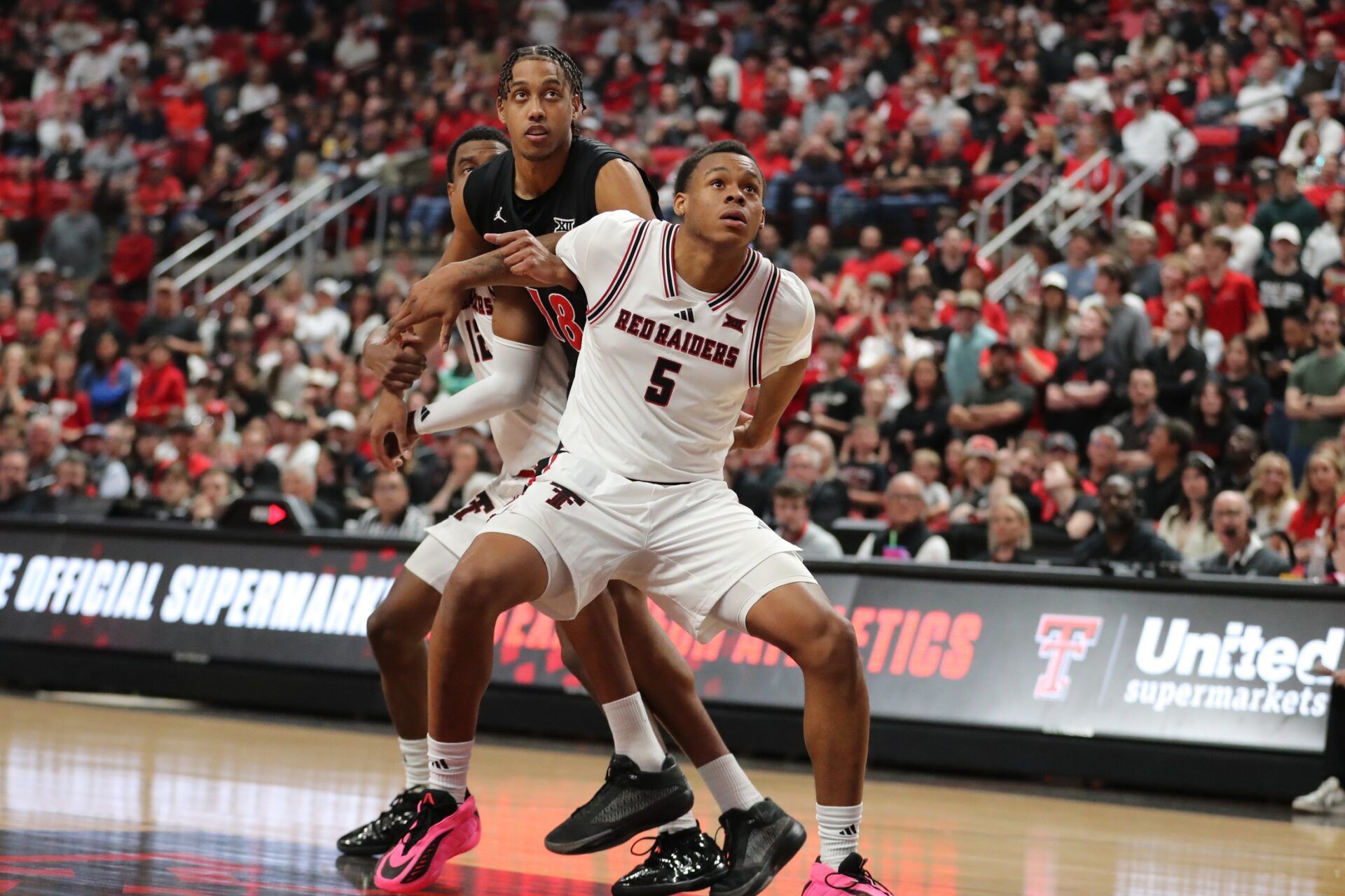 Texas Tech Red Raiders forward Josiah Moseley (5) boxes out Cincinnati Bearcats forward Baba Miller (18) in the second half at United Supermarkets Arena.
