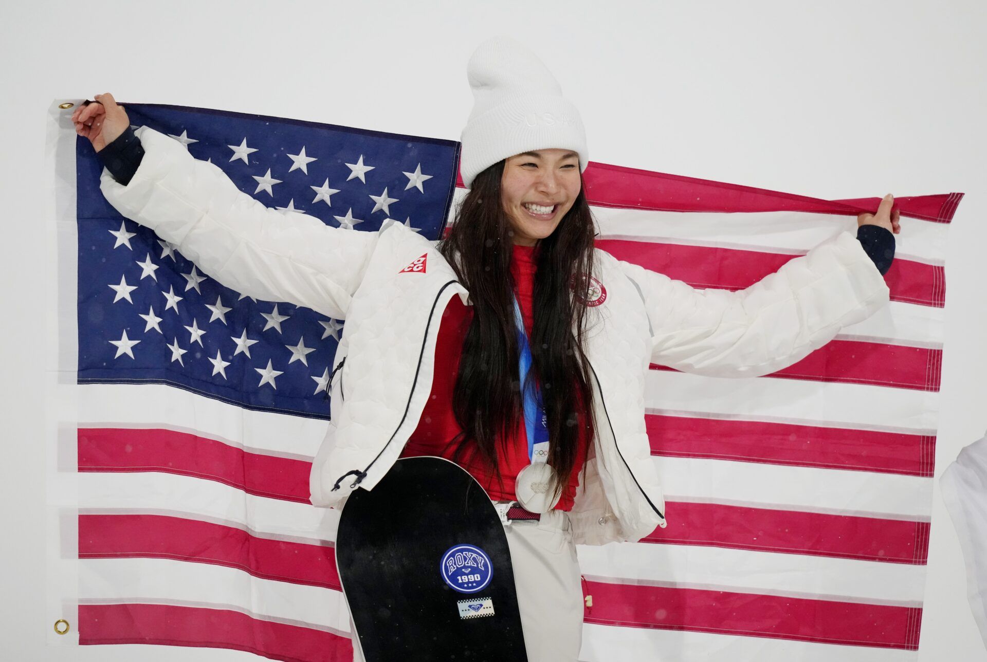 Chloe Kim of the United States celebrates her silver medal  in the women's halfpipe final during the Milano Cortina 2026 Olympic Winter Games at Livigno Snow Park.
