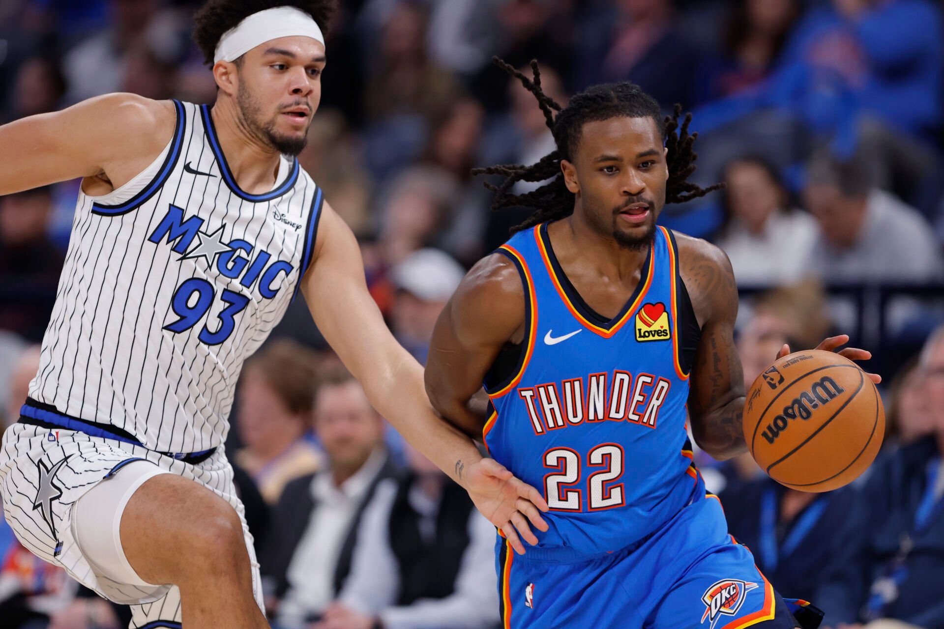 Orlando Magic guard/forward Noah Penda (93) defends a drive by Oklahoma City Thunder guard Shai Gilgeous-Alexander (2) during the second half at Paycom Center.