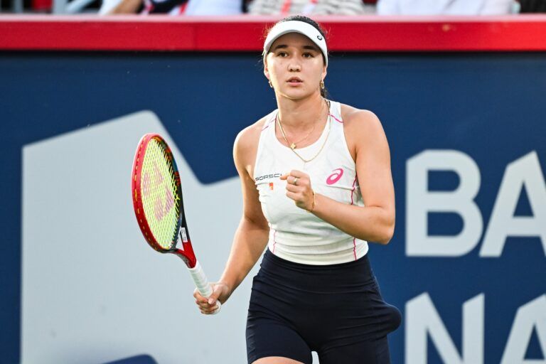 Eva Lys (GER) reacts after winning a point against Iga Swiatek (POL) in third round play at IGA Stadium.