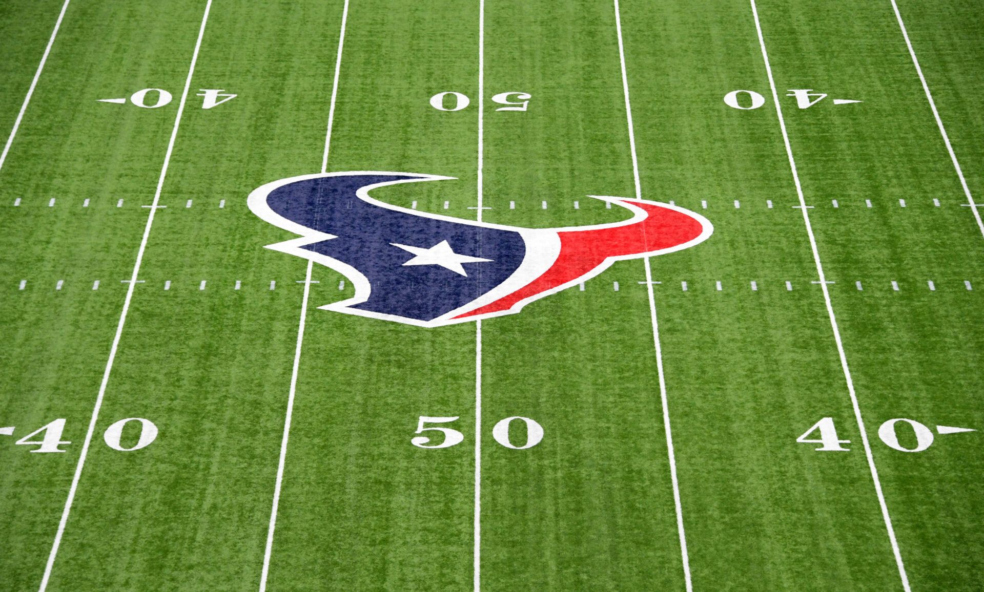 General view of the Houston Texans logo at midfield during a NFL football game against the Arizona Cardinals at NRG Stadium.