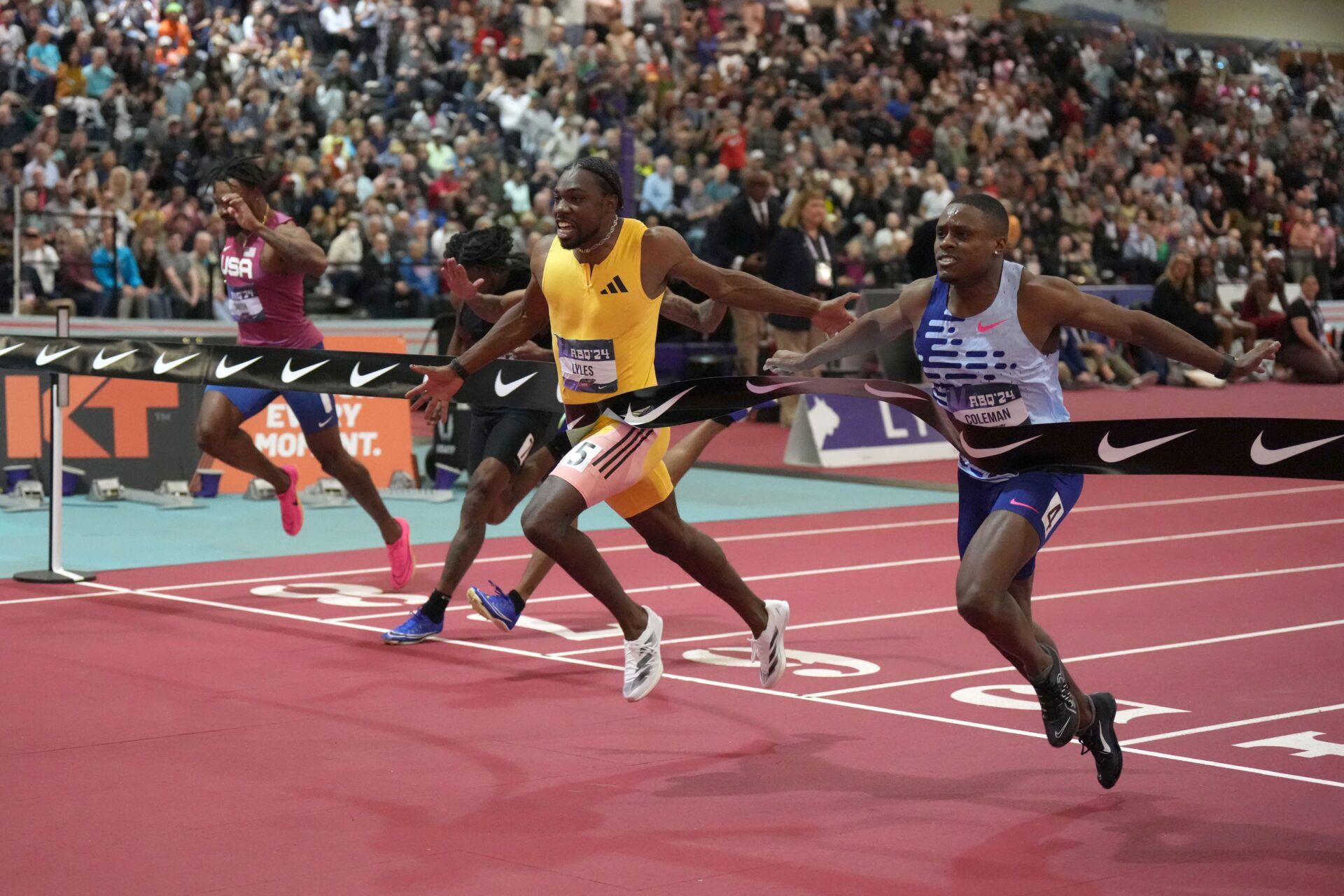 Noah Lyles (second from right) defeats Christian Coleman (right) to win the 60m, 6.43 to 6.44,during the USATF Indoor Championships at Albuquerque Convention Center. From left: JT Smith, ZaChaeus Beard, Emmanuel Wells, Lyles and Coleman.