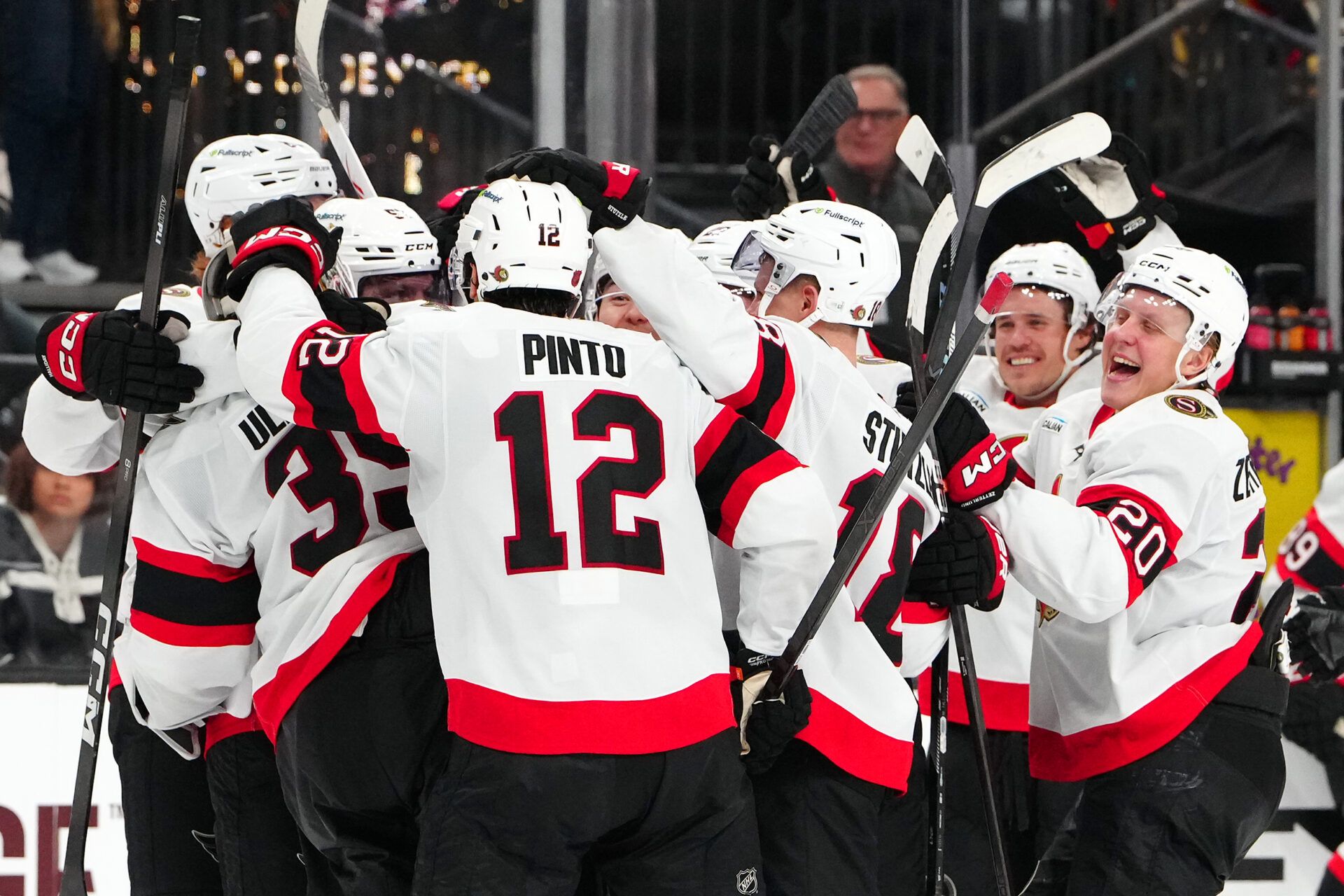 Ottawa Senators players celebrate at T-Mobile Arena.