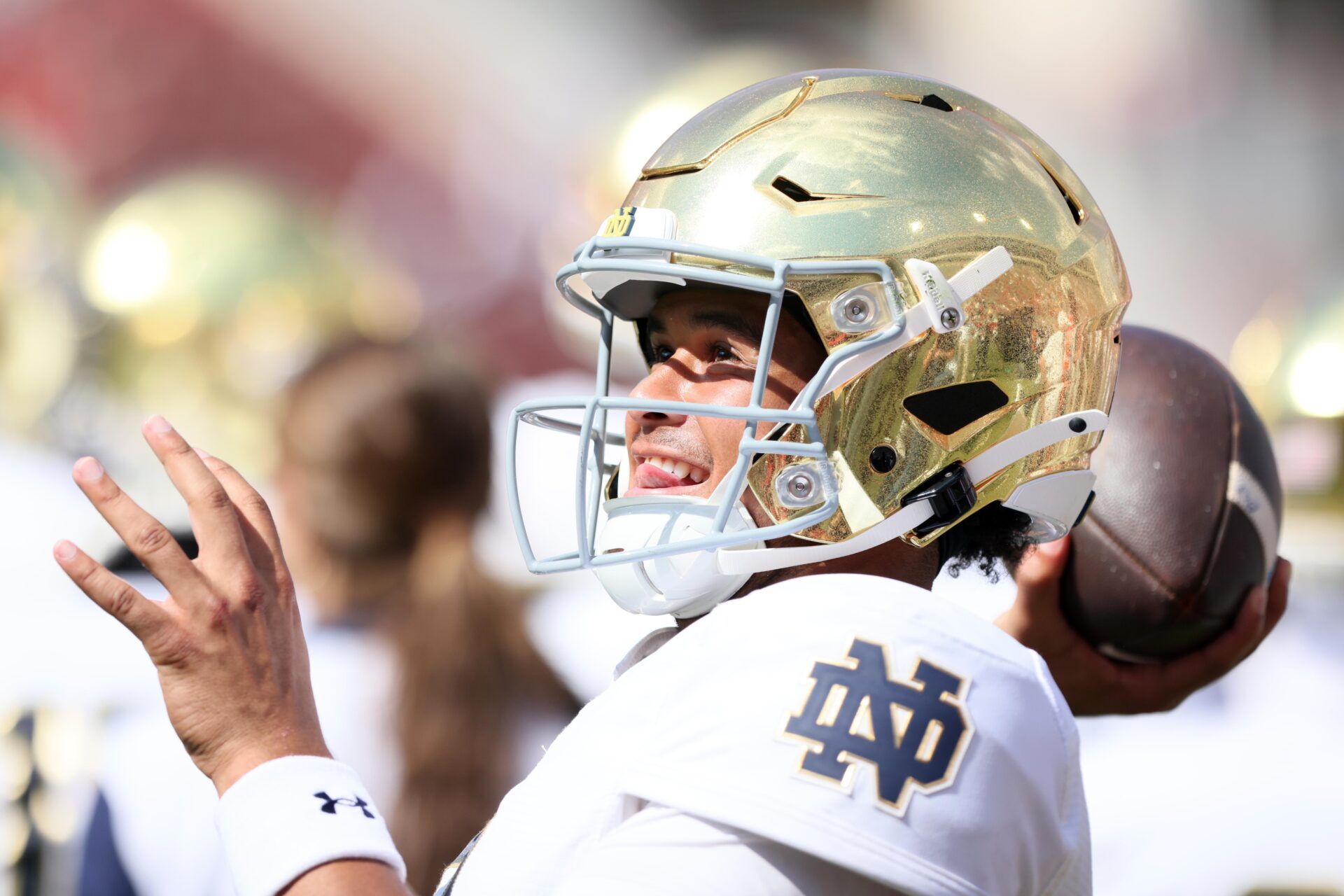 Notre Dame Fighting Irish quarterback Kenny Minchey (8) loosens up during the fourth quarter against the Arkansas Razorbacks at Donald W. Reynolds Razorback Stadium. Notre Dame won 56-13.
