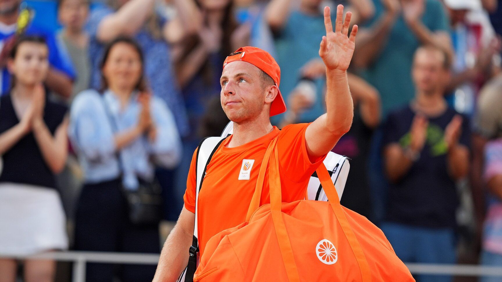 Tallon Griekspoor (NED) waves to the crowd after playing against Carlos Alcaraz (ESP) in the men’s tennis singles second round during the Paris 2024 Olympic Summer Games at Stade Roland Garros.