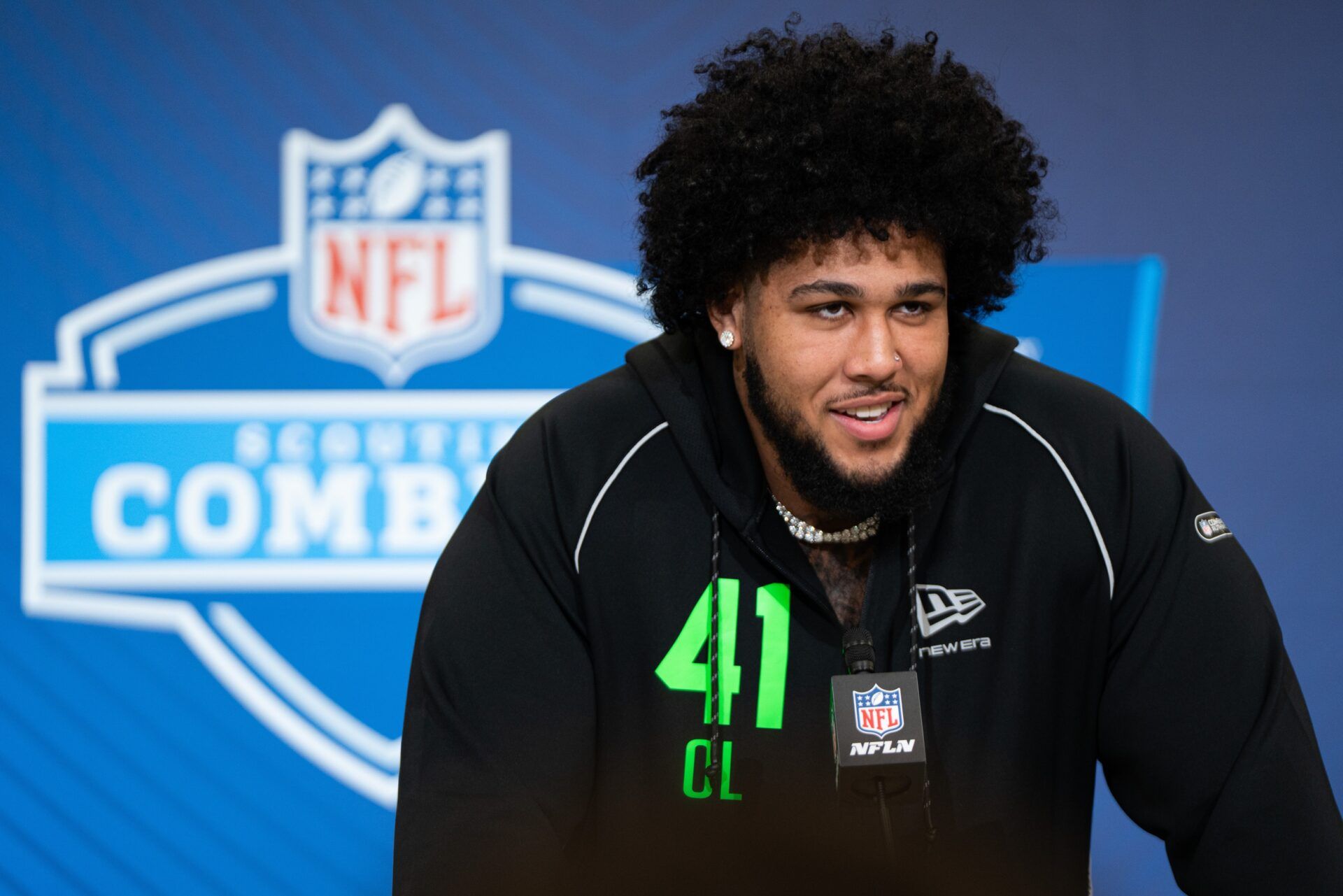 Alabama offensive lineman Kadyn Proctor (OL41) speaks to members of the media during the NFL Combine at the Indiana Convention Center.