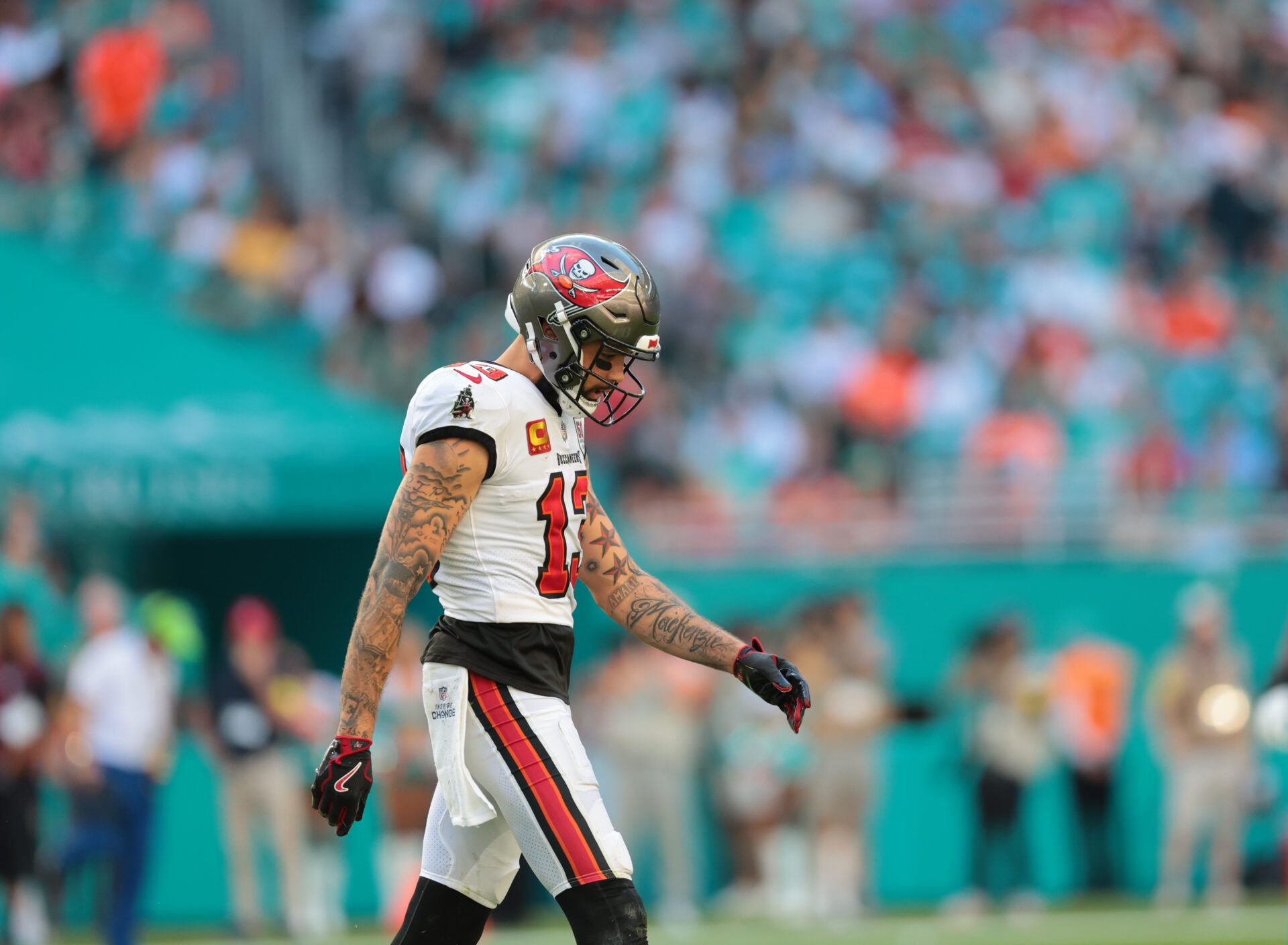 Tampa Bay Buccaneers wide receiver Mike Evans (13) walks on the field during the fourth quarter against the Miami Dolphins at Hard Rock Stadium.