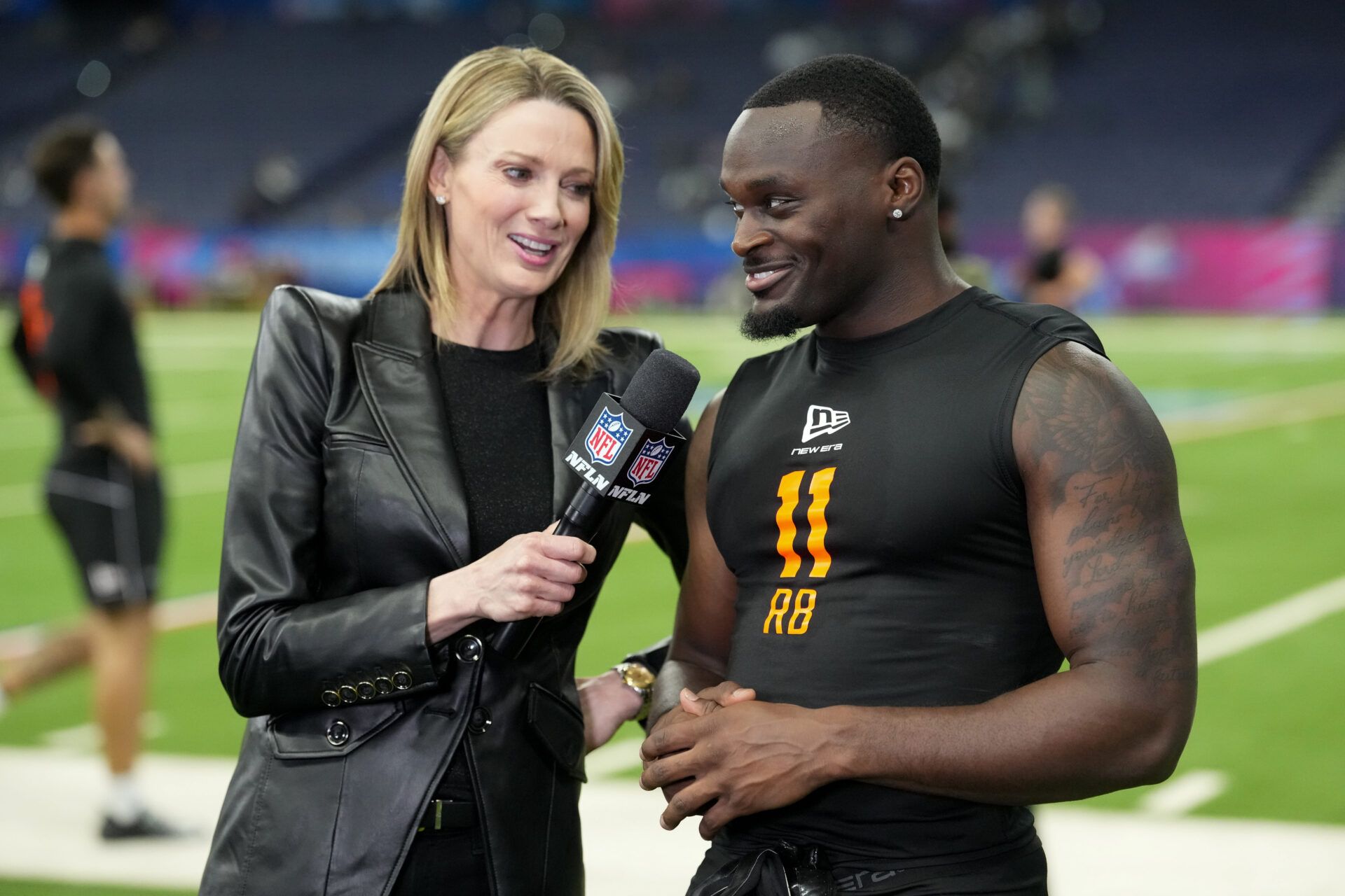 NFL Network reporter Stacey Dales interview Notre Dame running back Jeremiyah Love (RB11) during the NFL Scouting Combine at Lucas Oil Stadium.