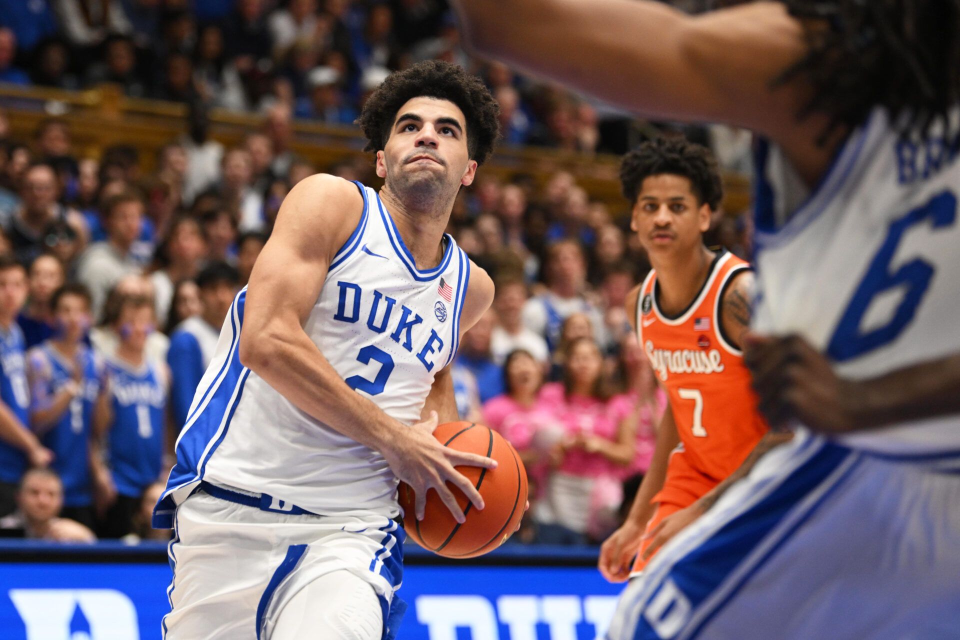 Duke Blue Devils guard Cayden Boozer (2) brings the ball to the basket against the Syracuse Orange during the second half at Cameron Indoor Stadium.