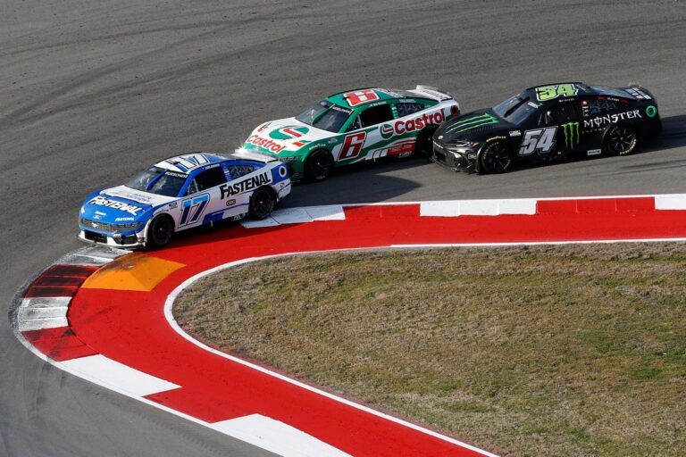 NASCAR Cup Series driver Brad Keselowski (6) bumps group leader NASCAR Cup Series driver Chris Buescher (17) while being nudged by NASCAR Cup Series driver Ty Gibbs (54) during the EchoPark Automotive Grand Prix at Circuit of the Americas.