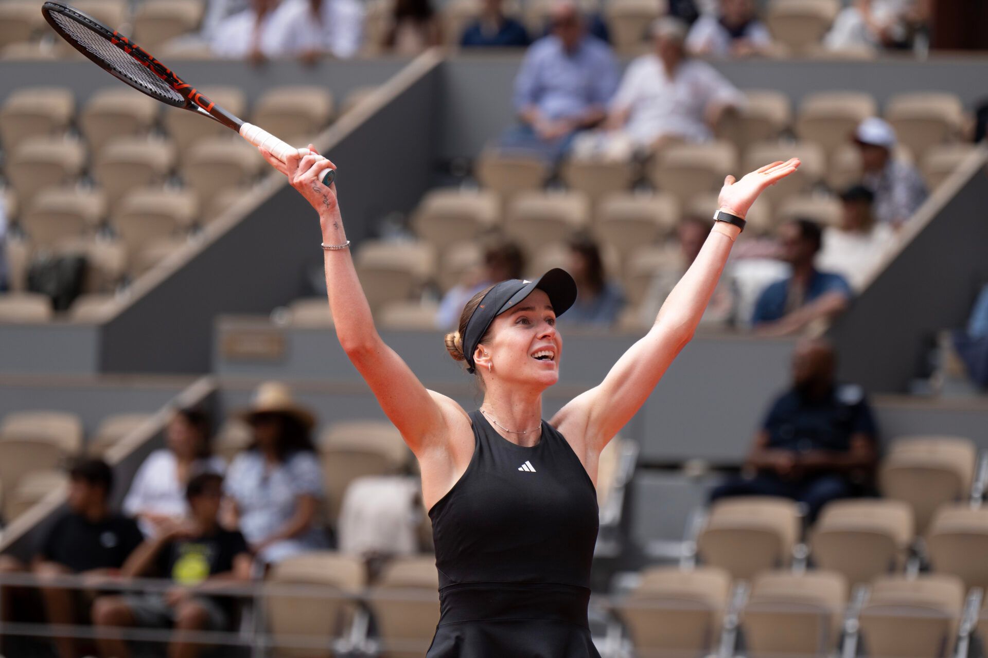 Elina Svitolina of Ukraine celebrates winning her match against Jasmine Paolini of Italy on day eight at Roland Garros Stadium.