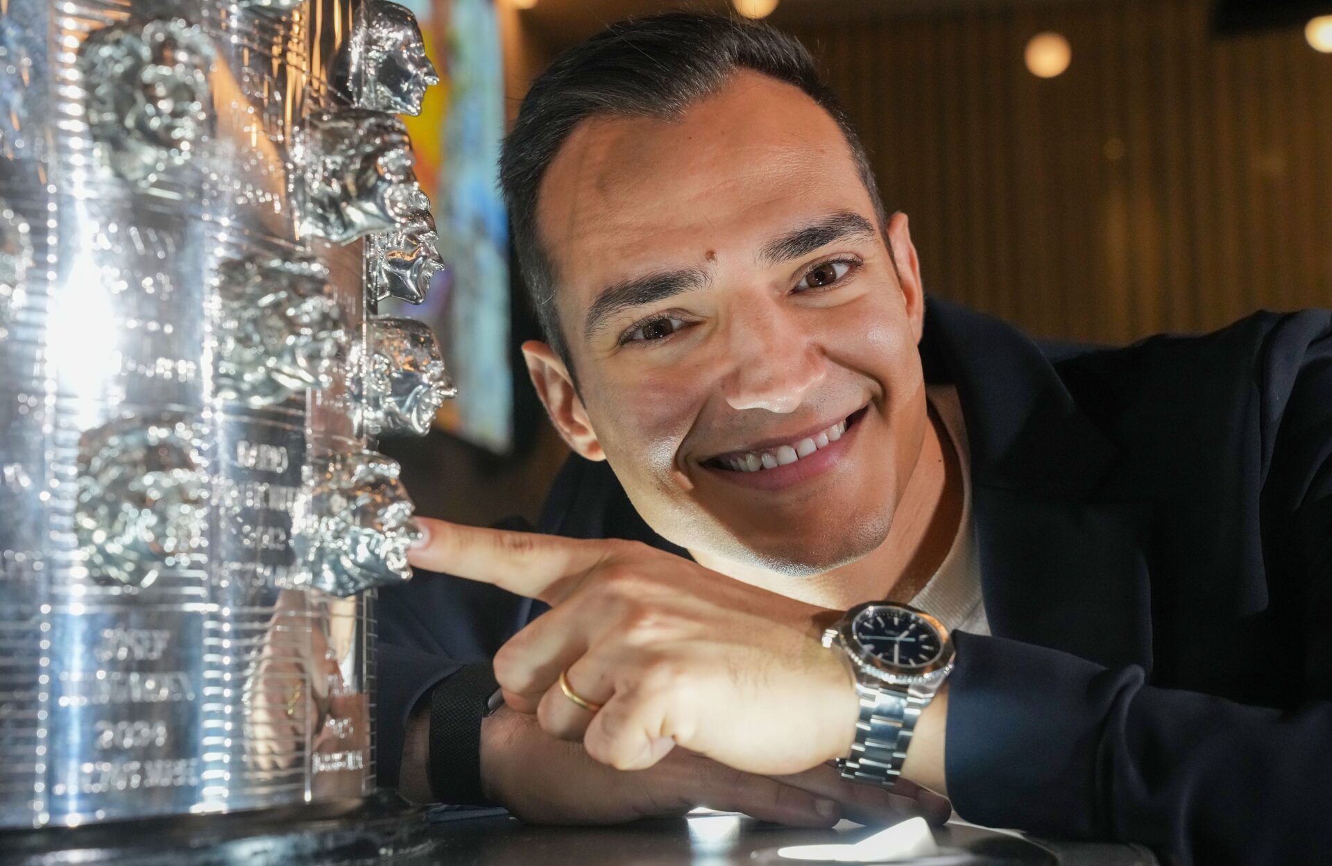 Alex Palou smiles for a photo Wednesday, Nov. 19, 2025, during the Borg-Warner trophy unveiling of the 2025 Indianapolis 500 champion Chip Ganassi driver Alex Palou at Above Event Center at Comission Row in Indianapolis.