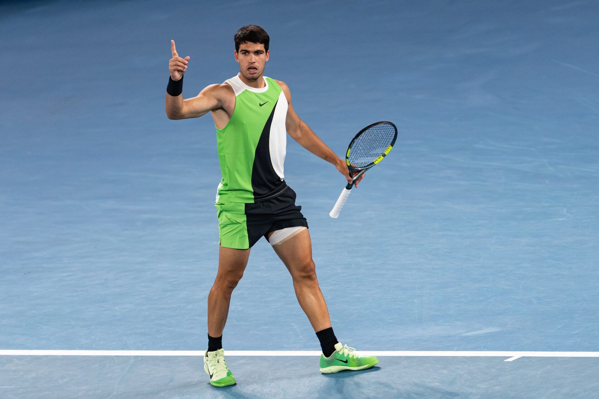 Carlos Alcaraz of Spain in action against Novak Djokovic of Serbia in the final of the mens singles at the Australian Open at Rod Laver Arena in Melbourne Park.