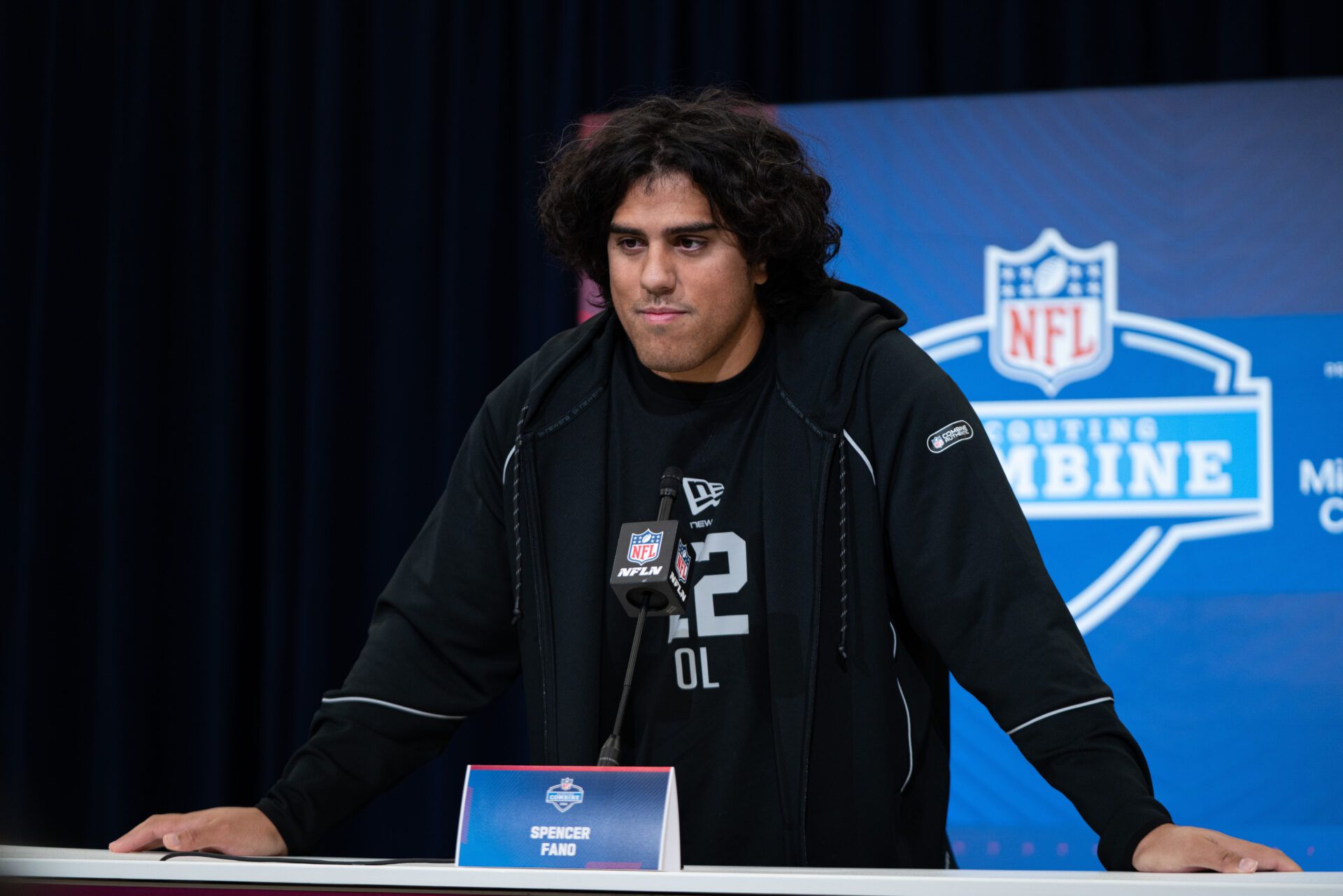 Utah offensive lineman Spencer Fano (OL22) speaks to members of the media during the NFL Combine at the Indiana Convention Center.