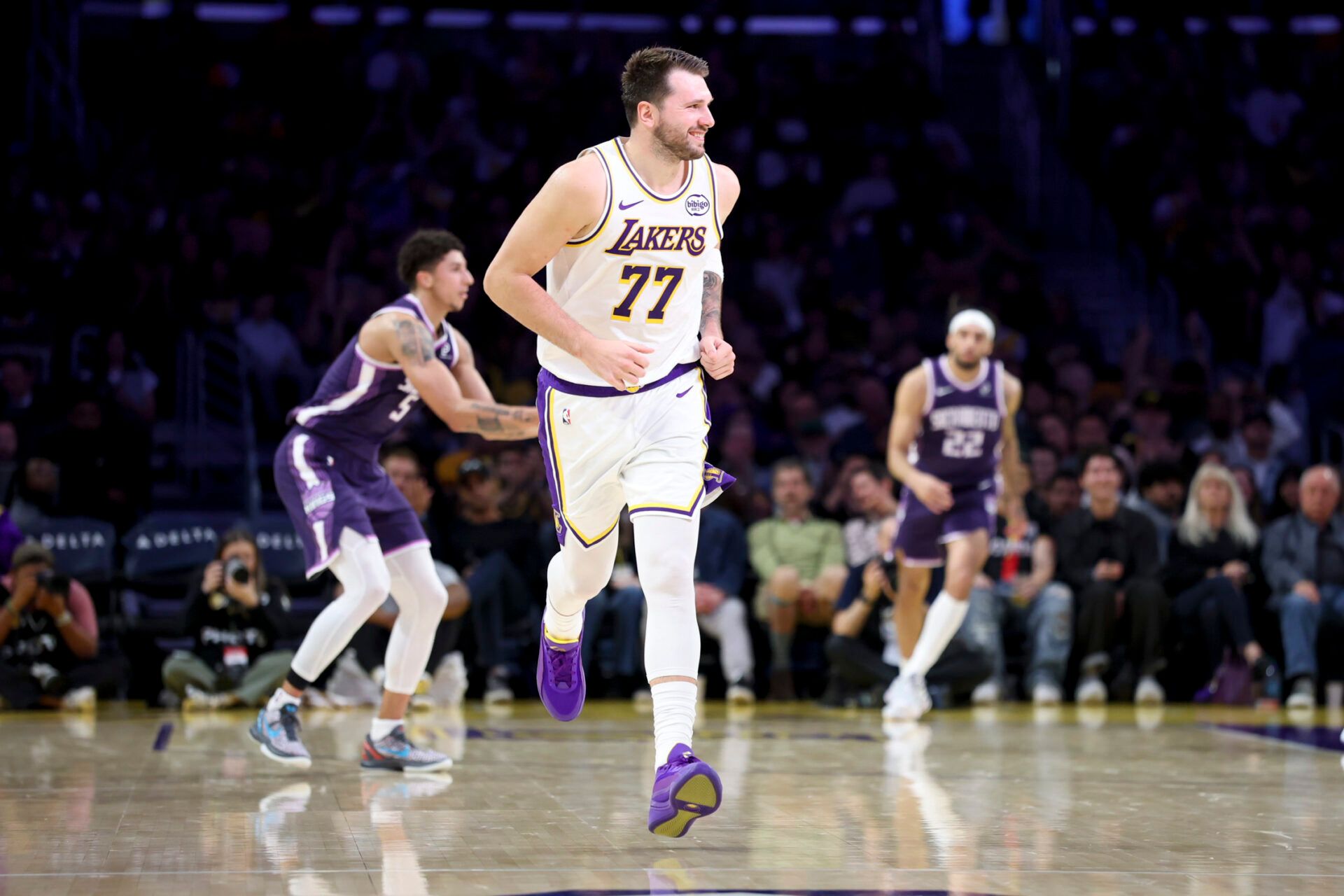 Los Angeles Lakers guard Luka Doncic (77) running across the court during the first quarter against the Sacramento Kings at Crypto.com Arena.