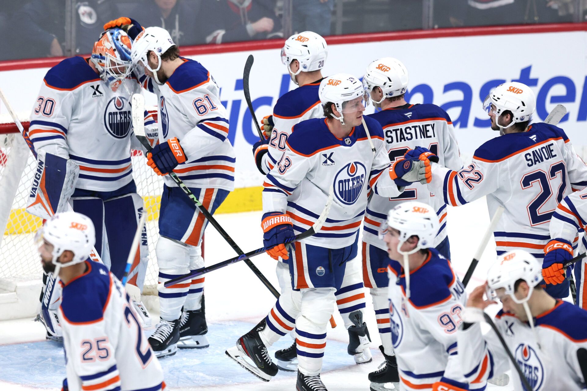 Edmonton Oilers players celebrate their victory at Canada Life Centre.