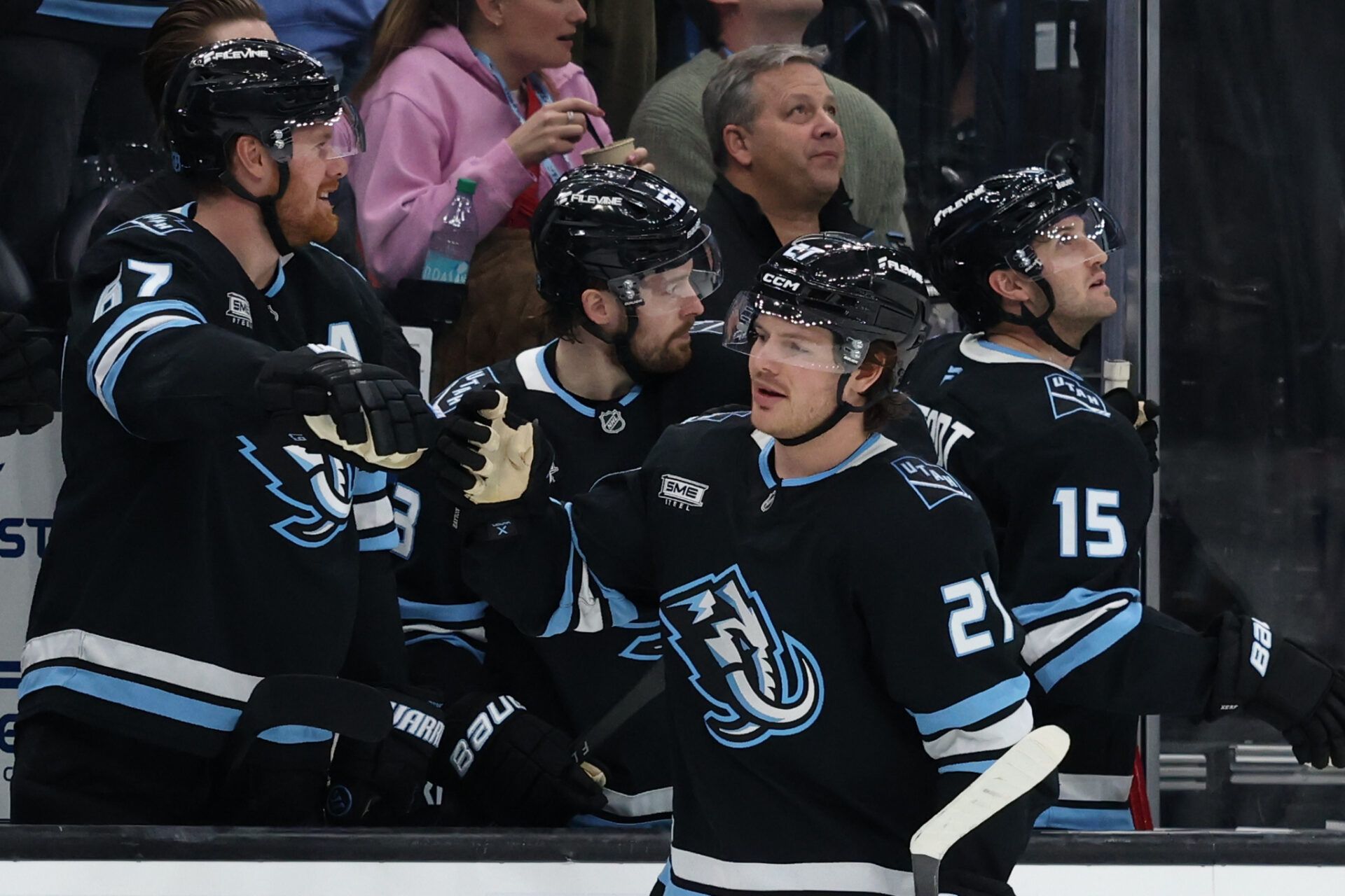 The Utah Mammoth celebrates a goal against the Minnesota Wild by center Barrett Hayton (27) during the third period at Delta Center.