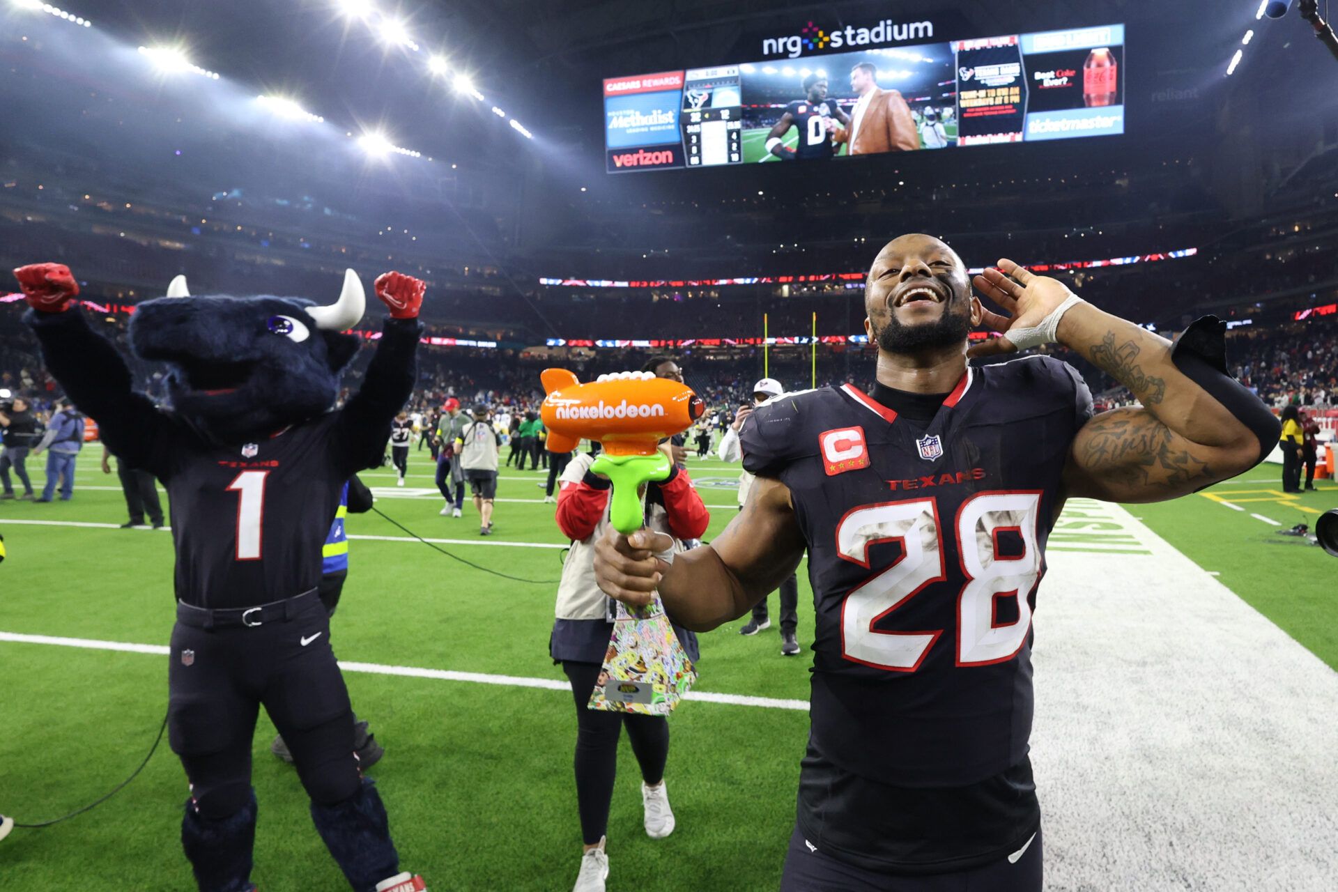 Houston Texans running back Joe Mixon (28) walks off the field after the win against the Los Angeles Chargers in an AFC wild card game at NRG Stadium.