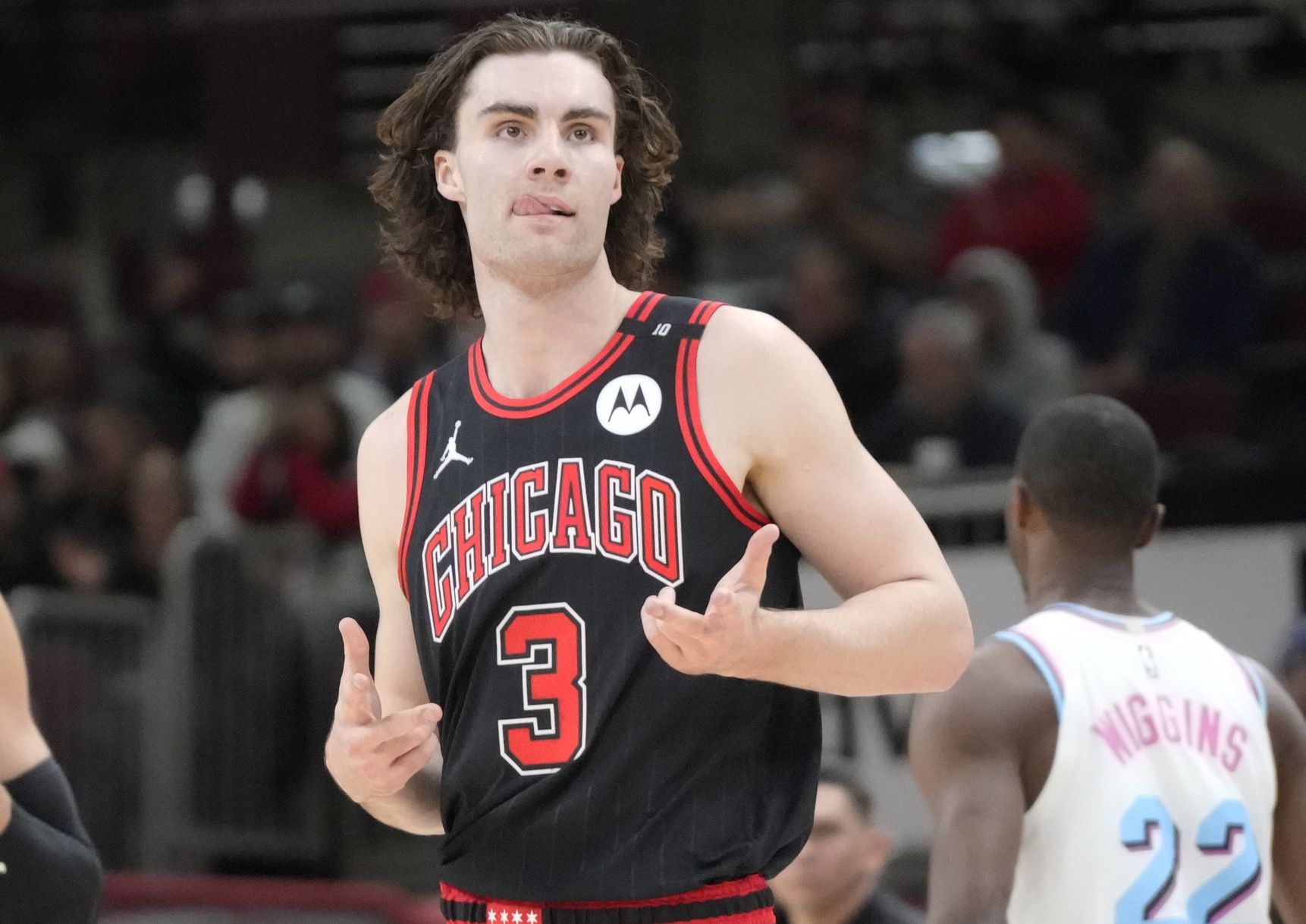 Chicago Bulls guard Josh Giddey (3) gestures after making a three point basket against the Miami Heat during the second half at United Center.