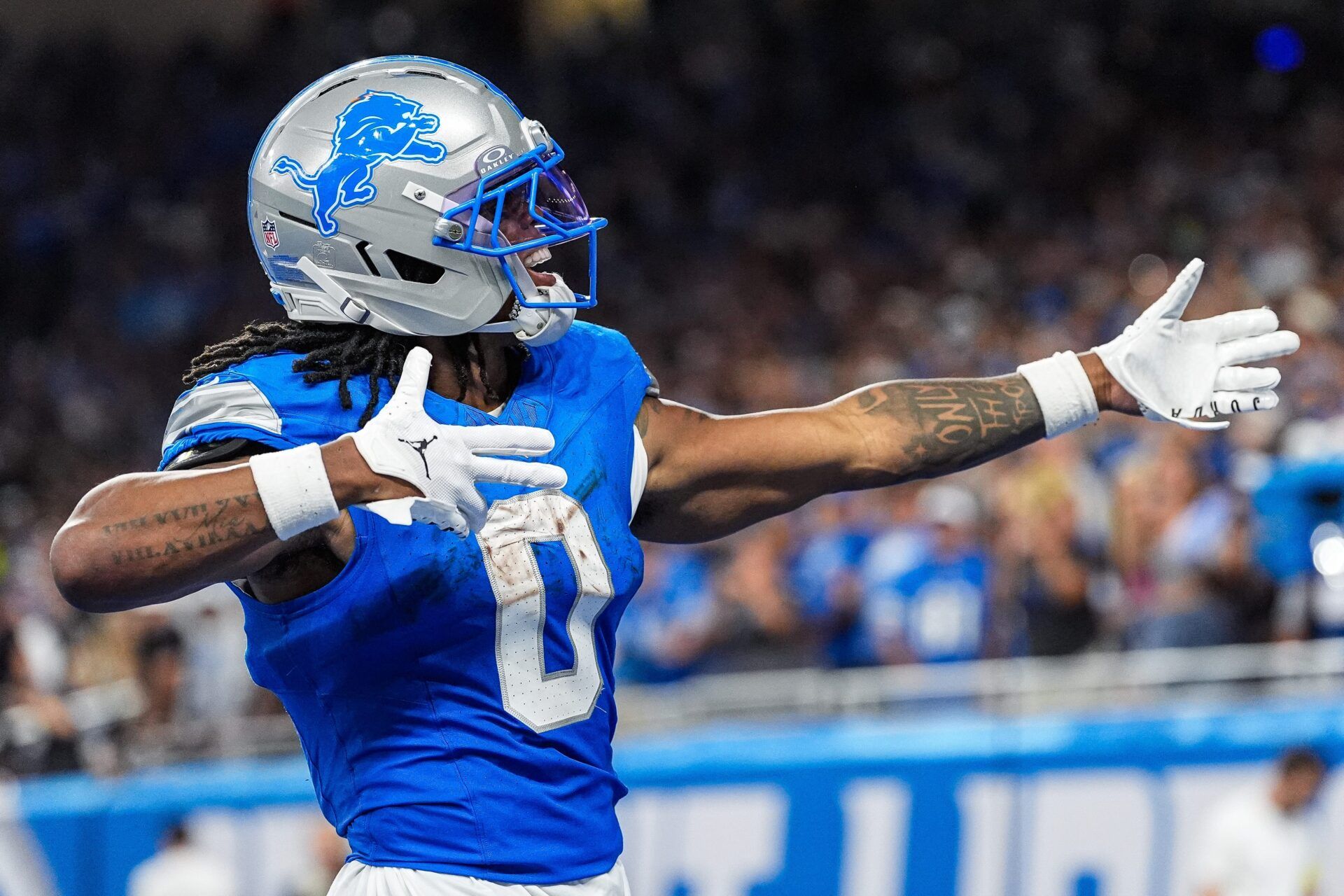 Detroit Lions running back Jahmyr Gibbs (0) celebrates first down against Chicago Bears during the second half at Ford Field in Detroit on Sunday, Sept. 14, 2025.