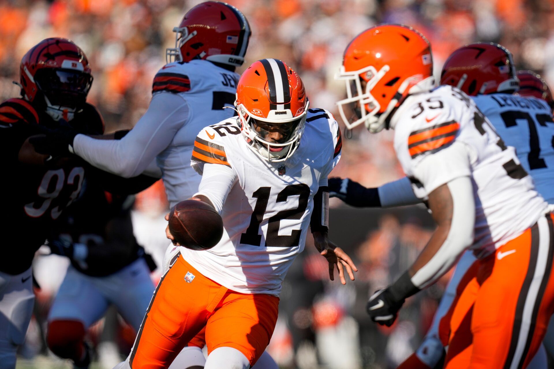 Cleveland Browns quarterback Shedeur Sanders (12) hands the ball off to running back Raheim Sanders (35) in the second quarter of the NFL Week 18 game between the Cincinnati Bengals and the Cleveland Browns at Paycor Stadium in Downtown Cincinnati on Sunday, Jan. 4, 2026.
