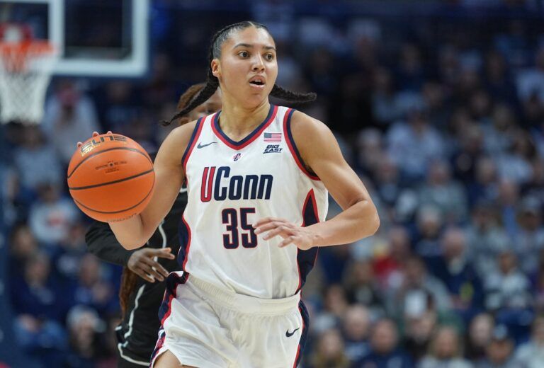 UConn Huskies guard Azzi Fudd (35) returns the ball against the Providence Friars in the first half at Harry A. Gampel Pavilion.