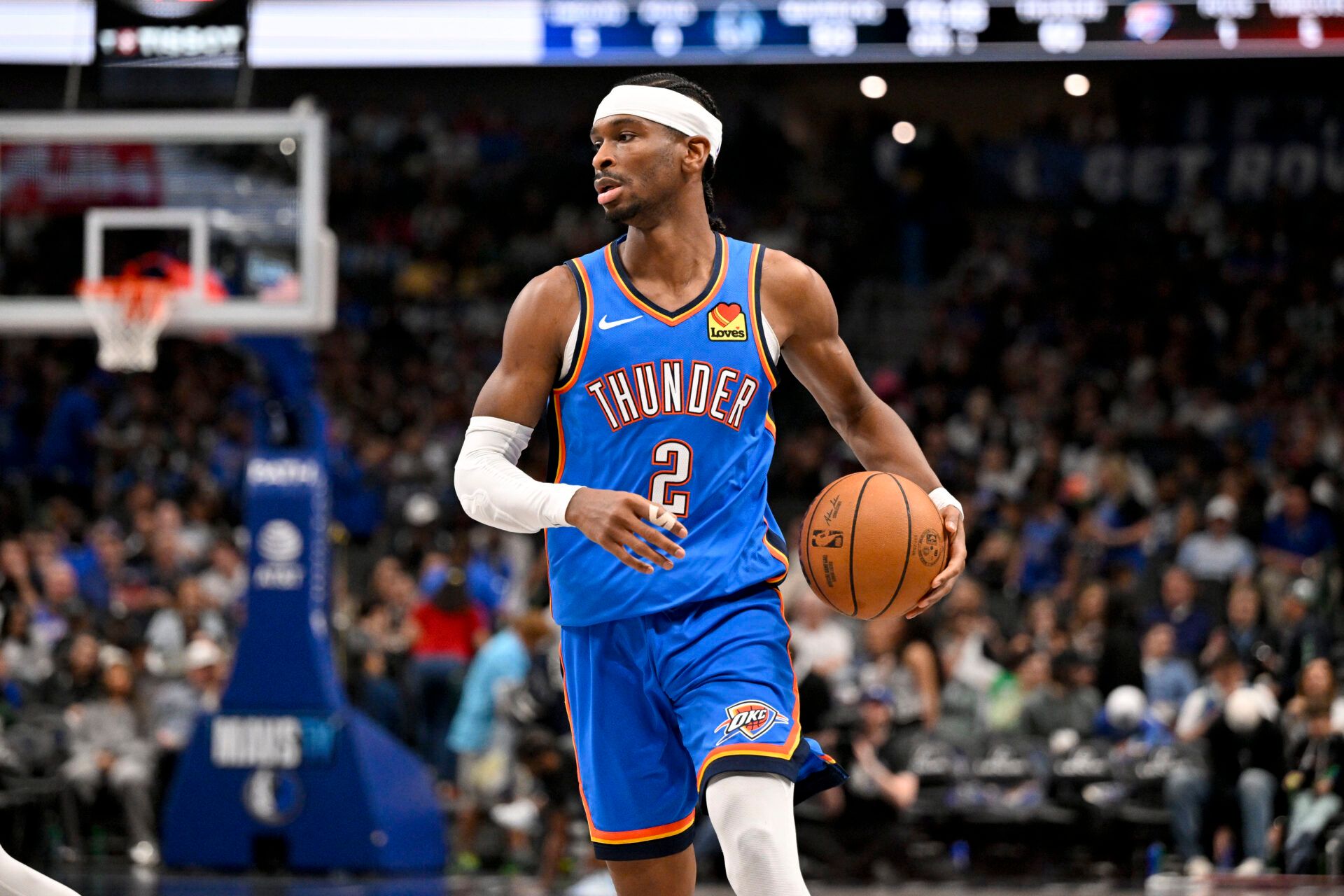 Oklahoma City Thunder guard Shai Gilgeous-Alexander (2) brings the ball up court against the Dallas Mavericks during the second half at the American Airlines Center.