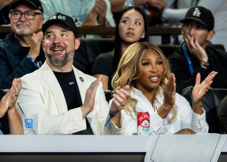 Los Angeles Golf Club owners Alexis Ohanian and Serena Williams cheer for their team against the New York Golf Club during the TGL semifinal match at SoFi Center on March 17, 2025, in Palm Beach Gardens, Florida.