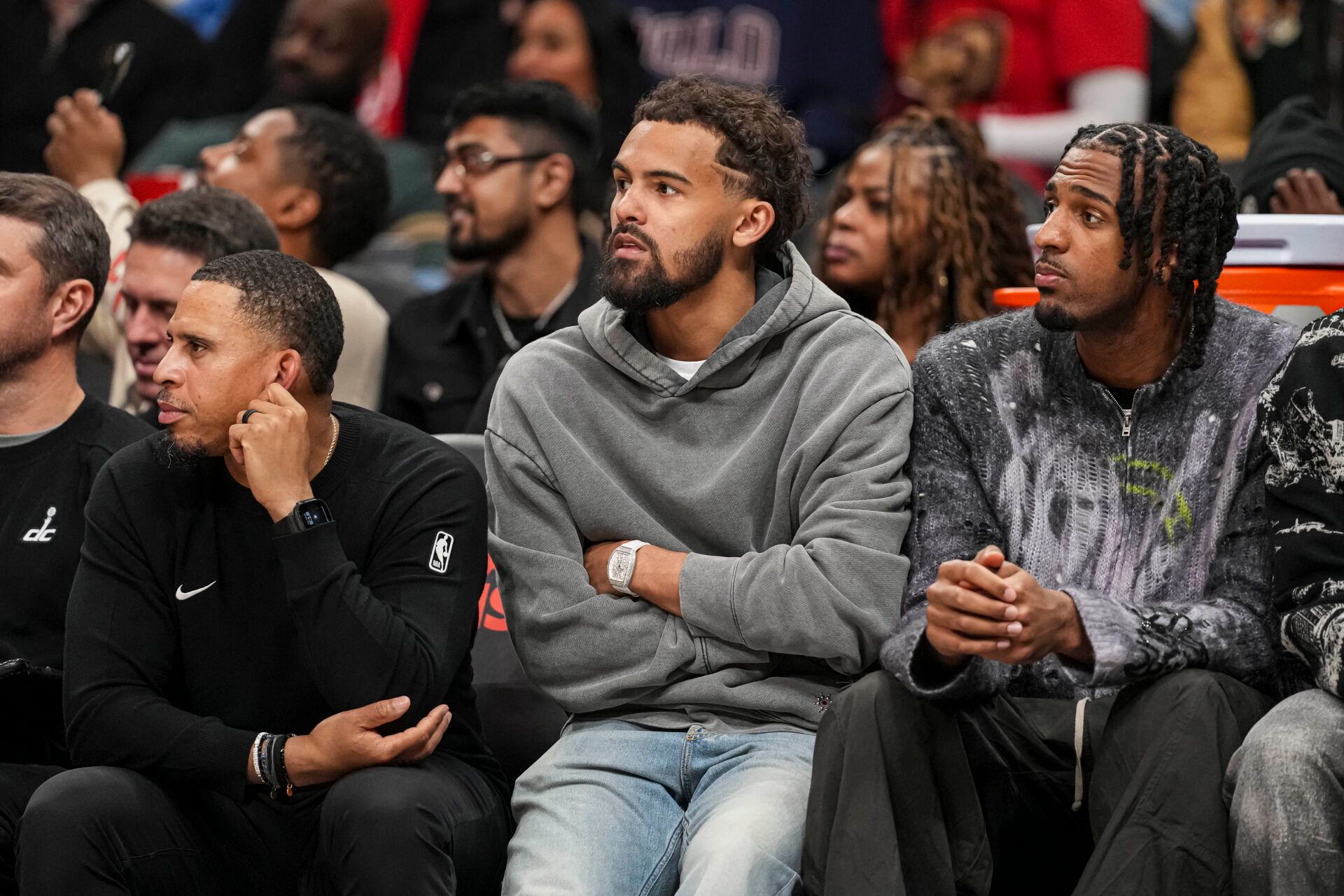 Washington Wizards guard Trae Young (3) watches from the bench during the game against the Atlanta Hawks during the second half at State Farm Arena.