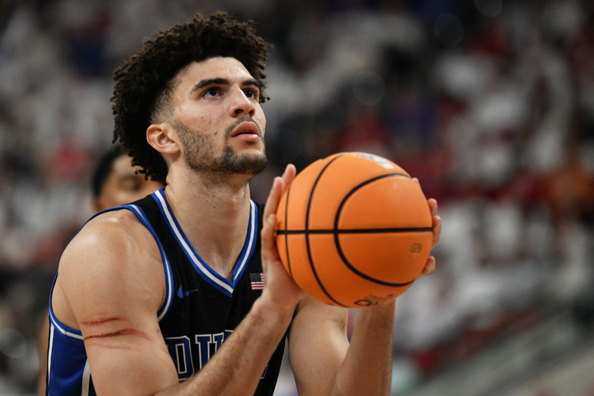 Duke Blue Devils forward Cameron Boozer (12) shoots a free throw during the second half against the NC State Wolfpack at Lenovo Center.