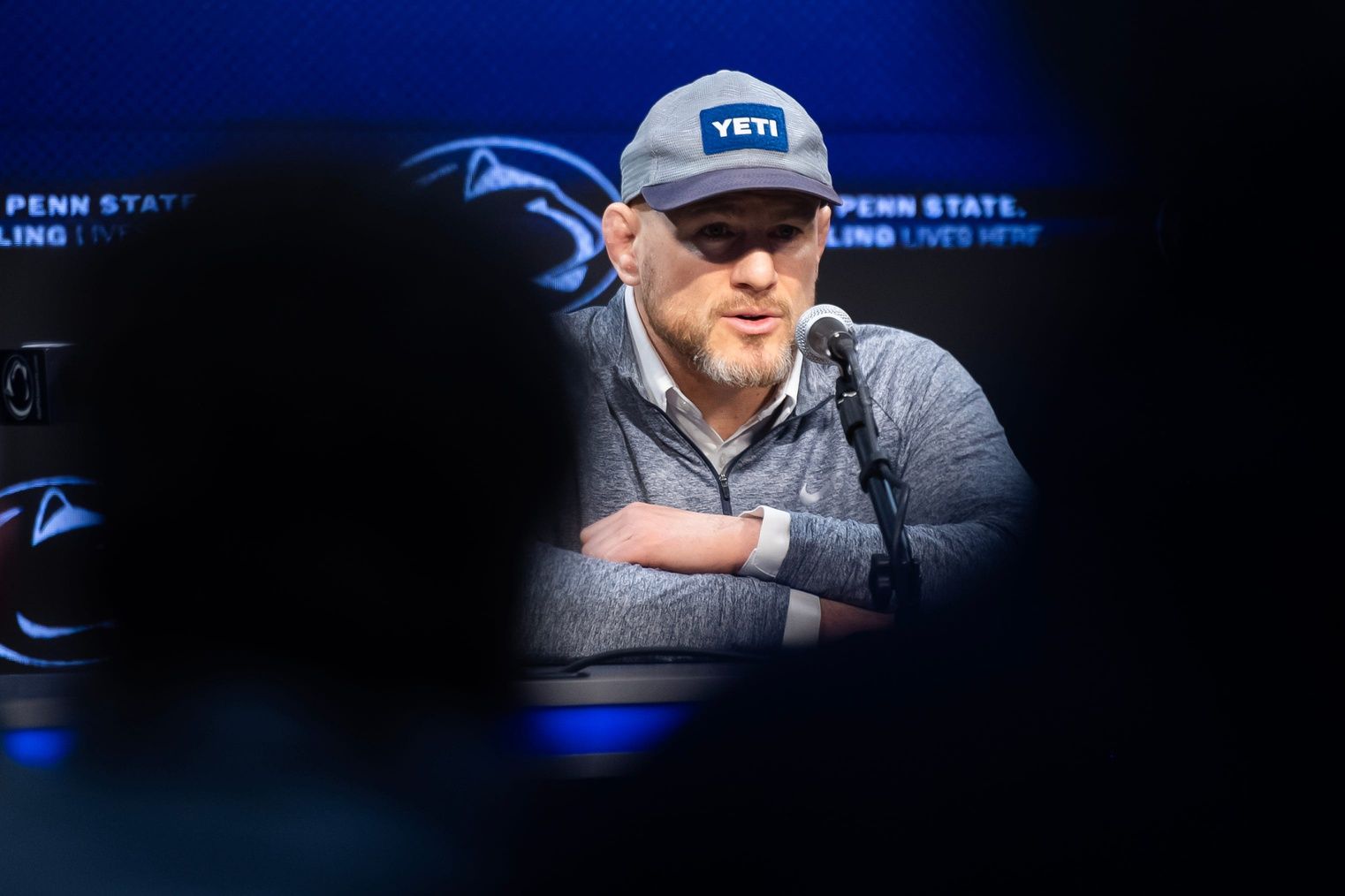 Penn State head coach Cael Sanderson answers questions during a post-match press conference following the Nittany Lions' 26-12 win over Nebraska on January 30, 2026, in State College.