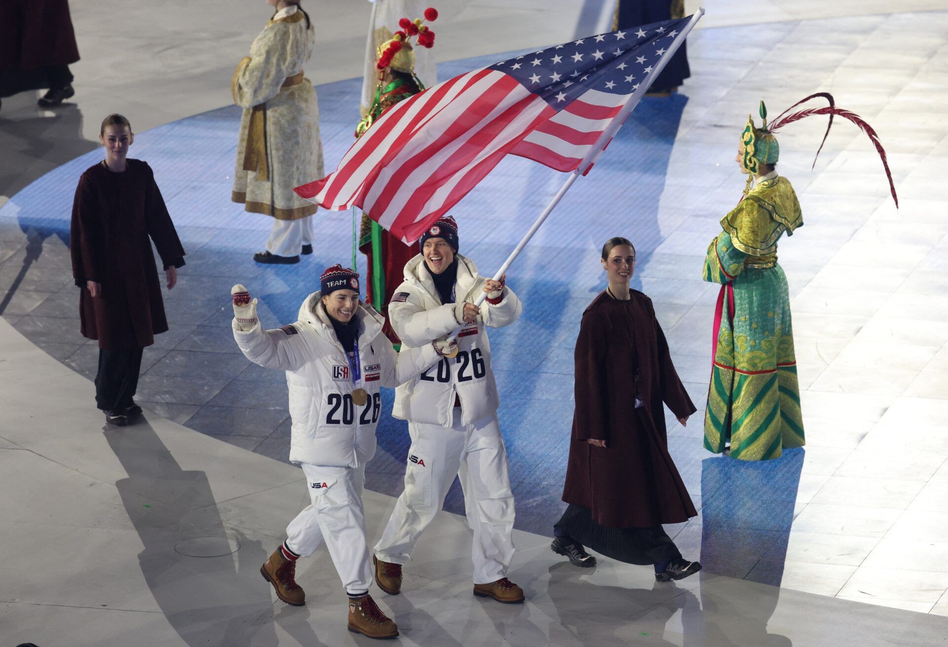 [US, Mexico & Canada customers only] Feb 22, 2026; Milan, Italy; Flag bearers Hilary Knight of United States and Evan Bates of United States in the athletes parade in the Closing Ceremony of the Milano Cortina 2026 Olympic Winter Games at Verona Olympic Arena.