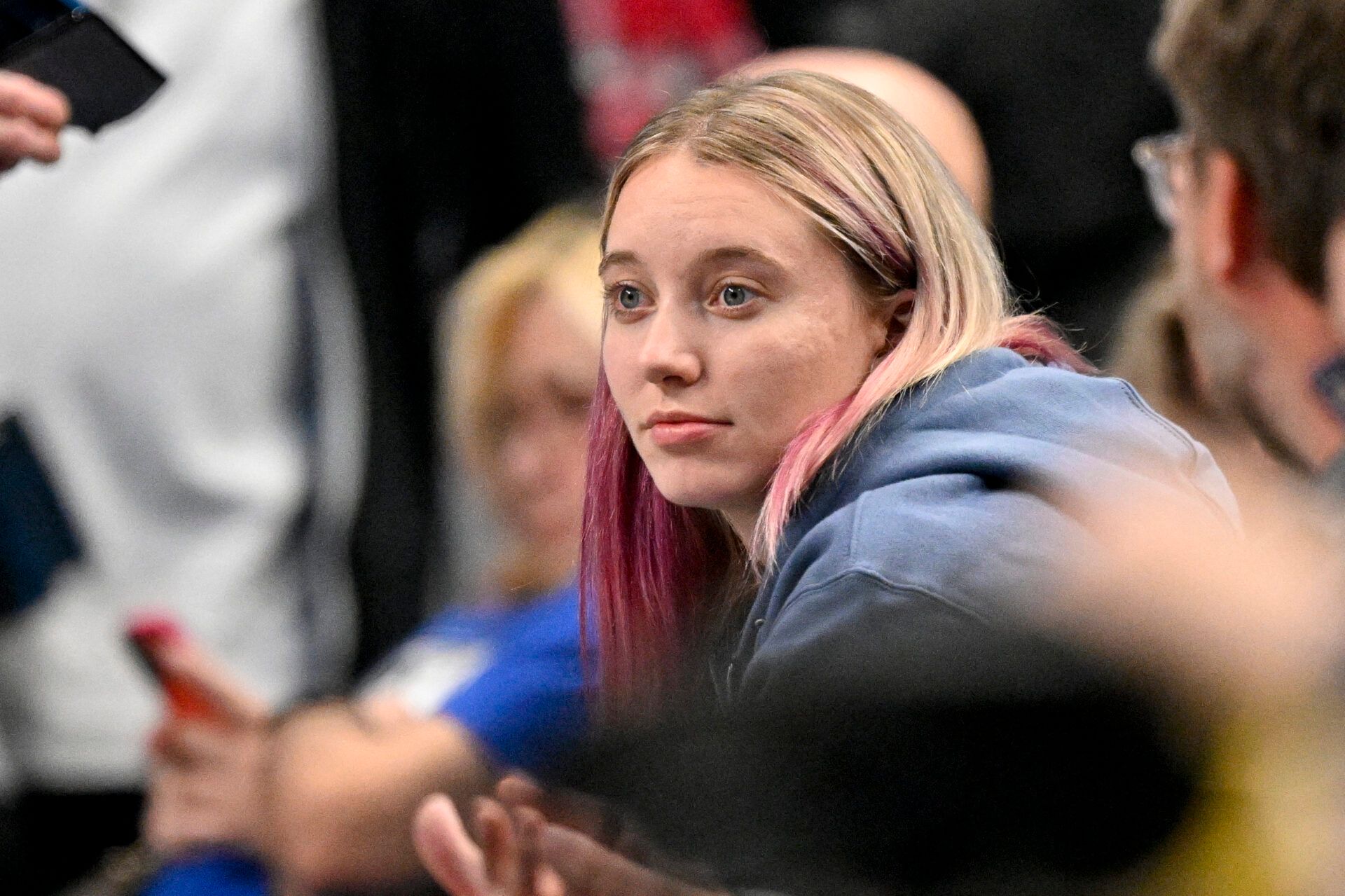 Dallas Wings point guard Paige Bueckers watches the game between the Dallas Mavericks and the New York Knicks during the second half at the American Airlines Center.