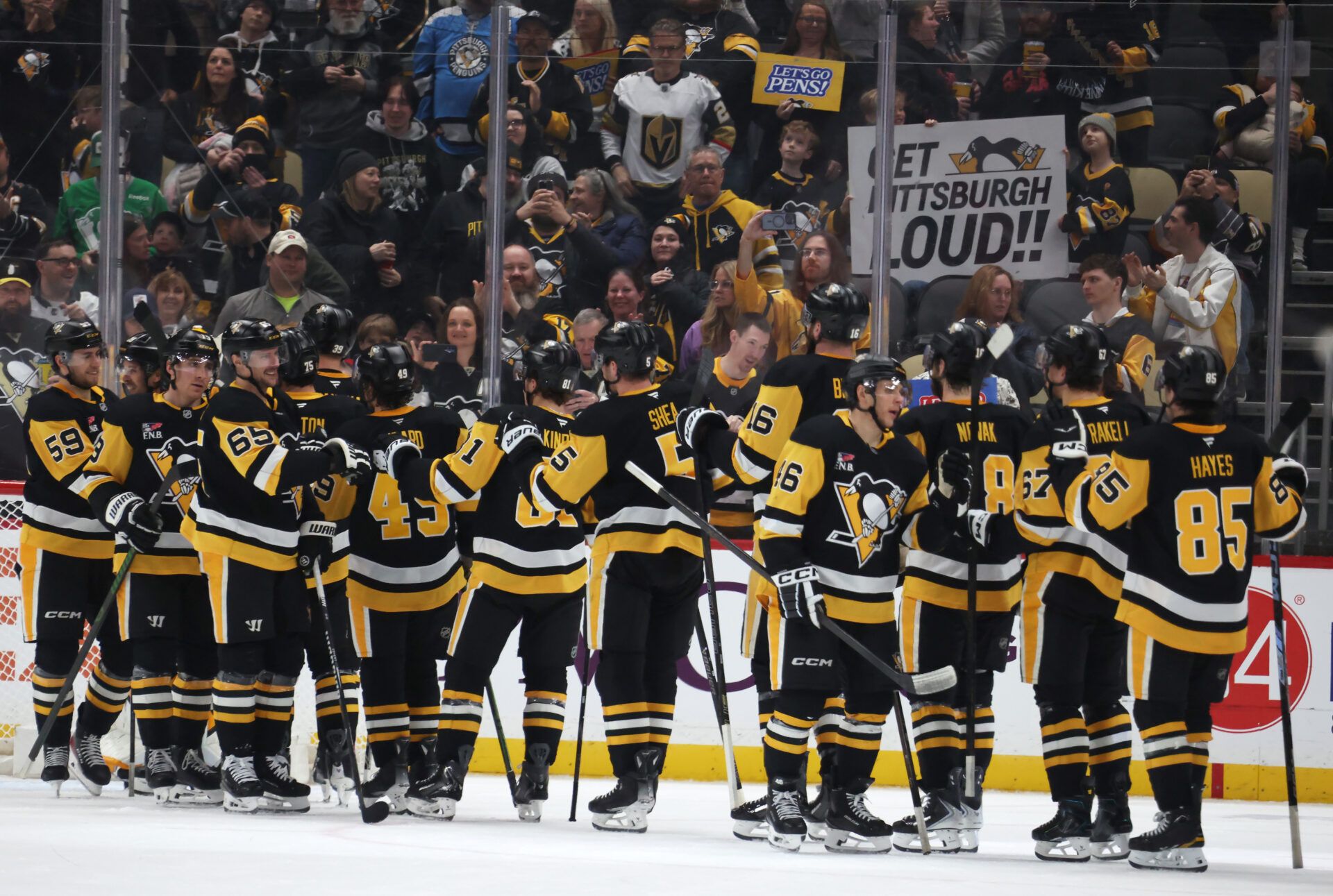 The Pittsburgh Penguins celebrate at PPG Paints Arena.