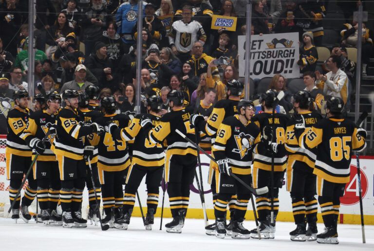 The Pittsburgh Penguins celebrate at PPG Paints Arena.