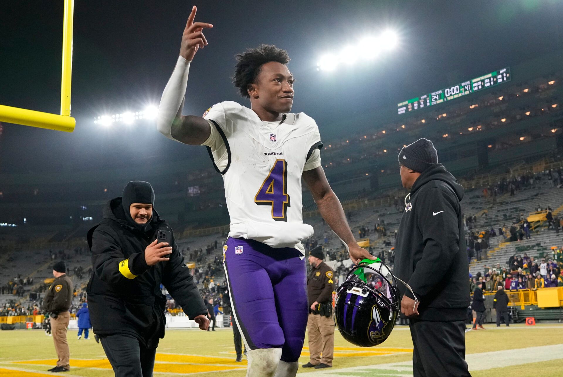 Baltimore Ravens wide receiver Zay Flowers (4) celebrates after the game against the Green Bay Packers at Lambeau Field.