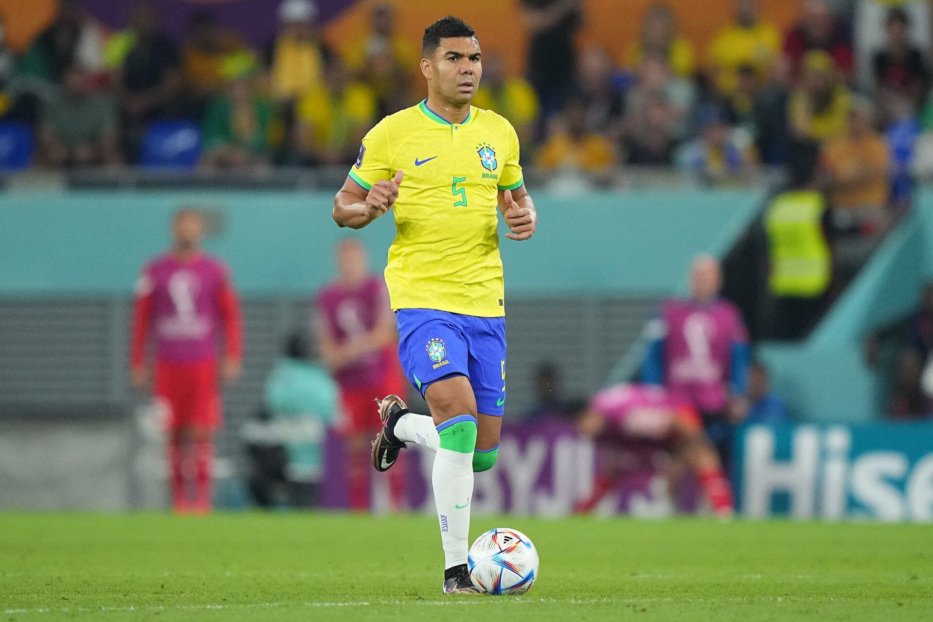 Brazil midfielder Casemiro (5) moves the ball against Switzerland in the second half of a group stage match during the 2022 World Cup at Stadium 974.