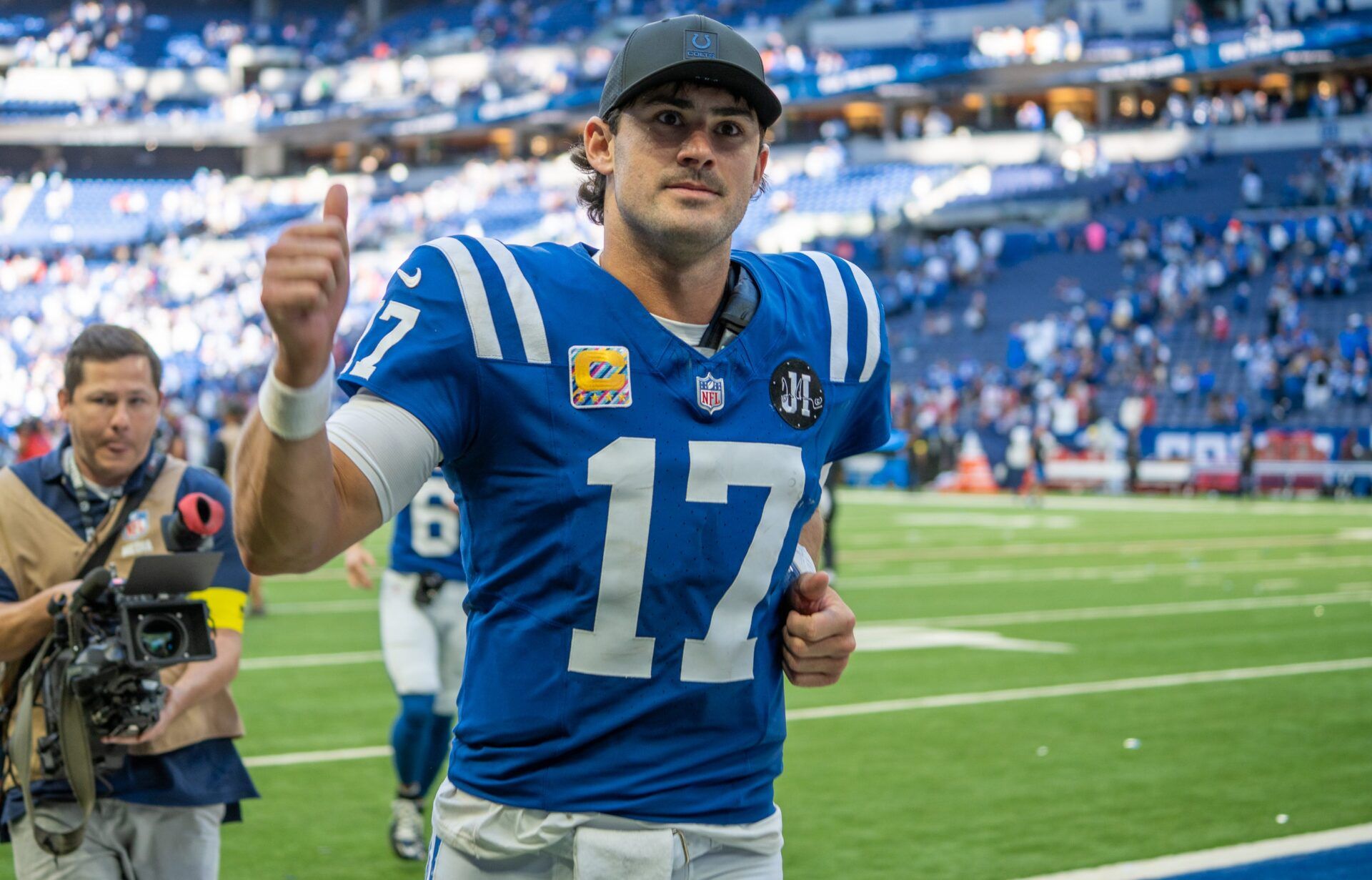 Indianapolis Colts quarterback Daniel Jones (17) makes his way off the field Sunday, Oct. 12, 2025, after a 31-27 win over the Arizona Cardinals at Lucas Oil Stadium. © Mykal McEldowney/IndyStar / USA TODAY NETWORK via Imagn Images