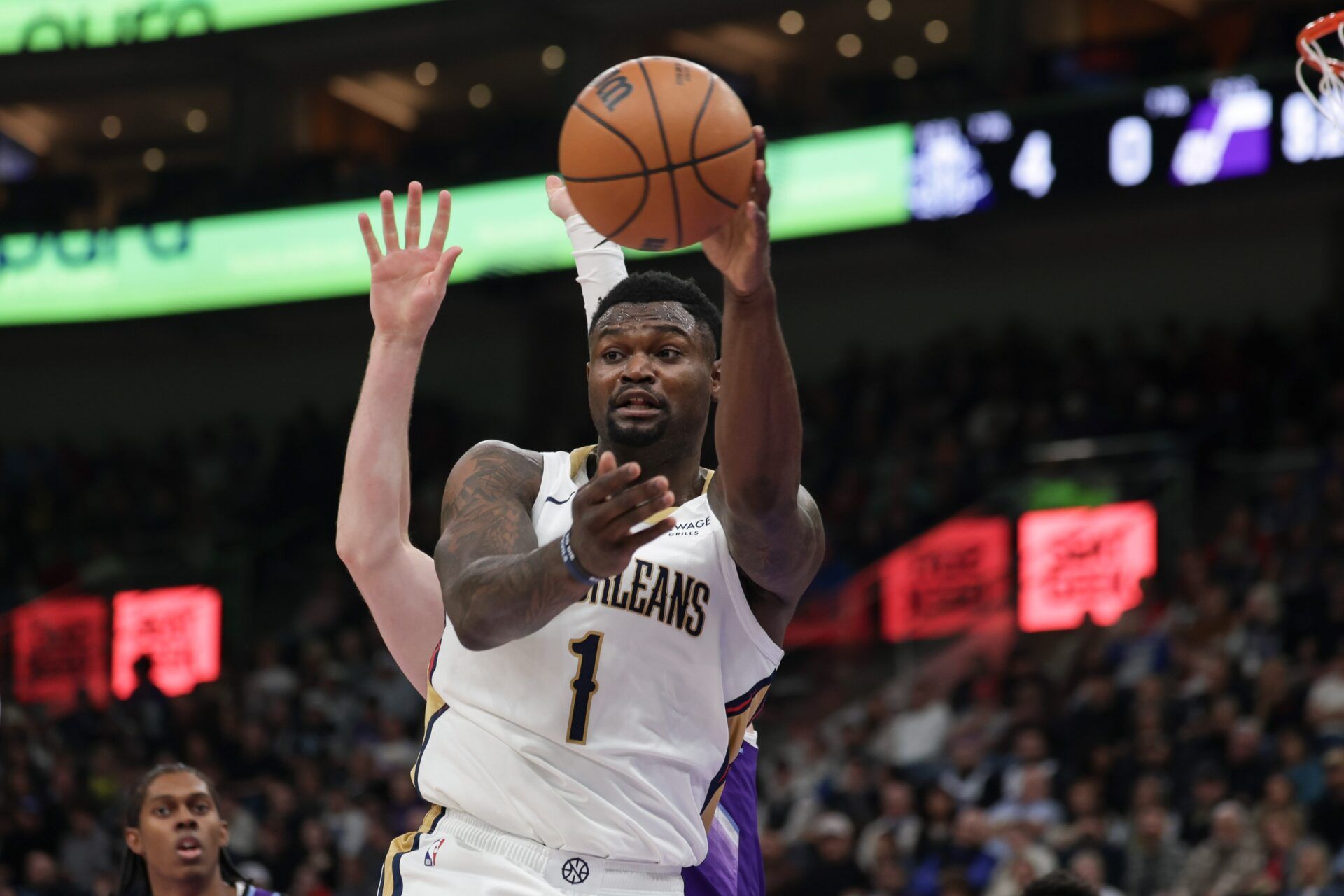 New Orleans Pelicans forward Zion Williamson (1) passes the ball during the first quarter against the Utah Jazz at Delta Center.