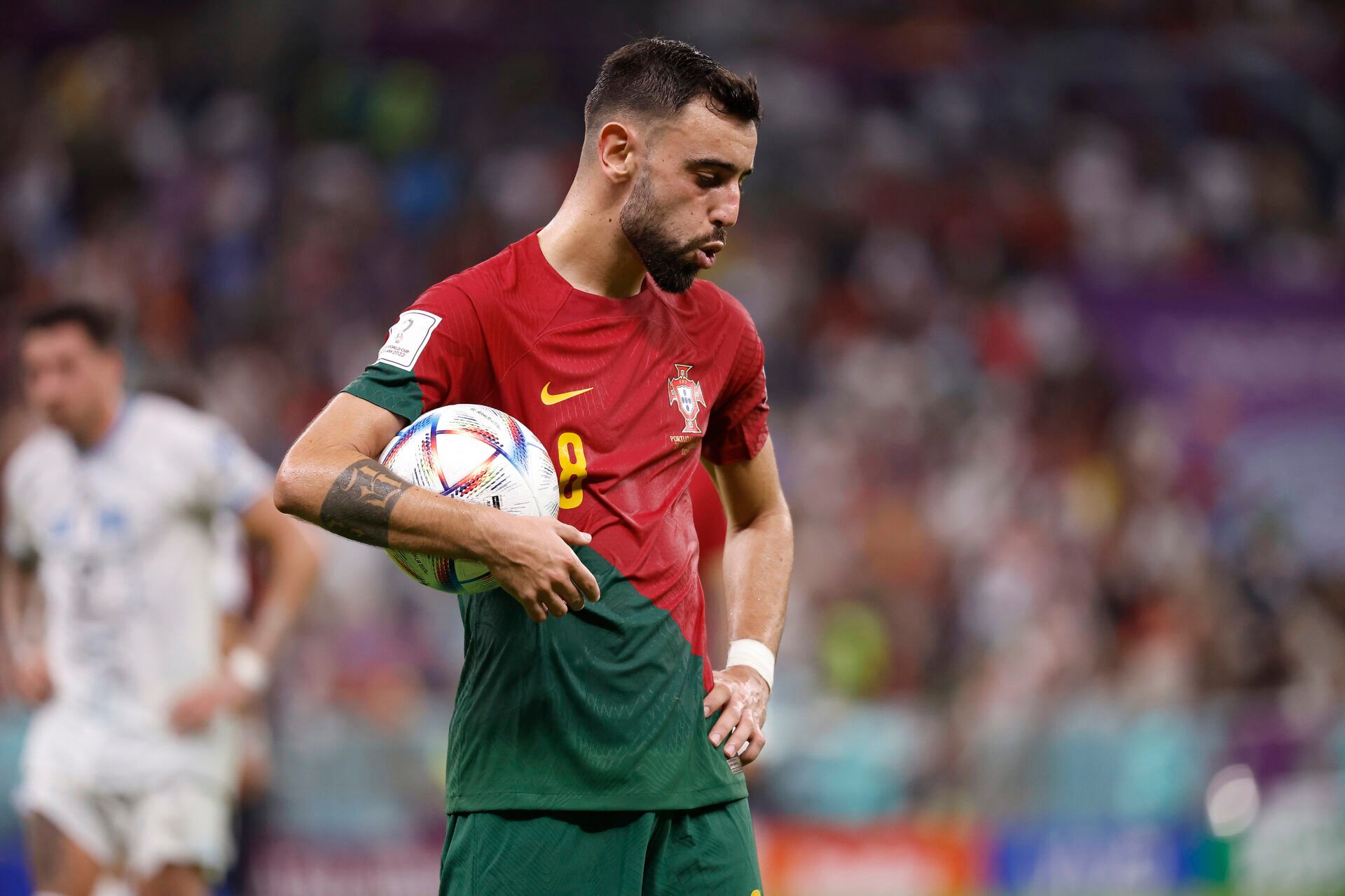 Portugal midfielder Bruno Fernandes (8) reacts during the second half of the group stage match in the 2022 World Cup at Lusail Stadium.